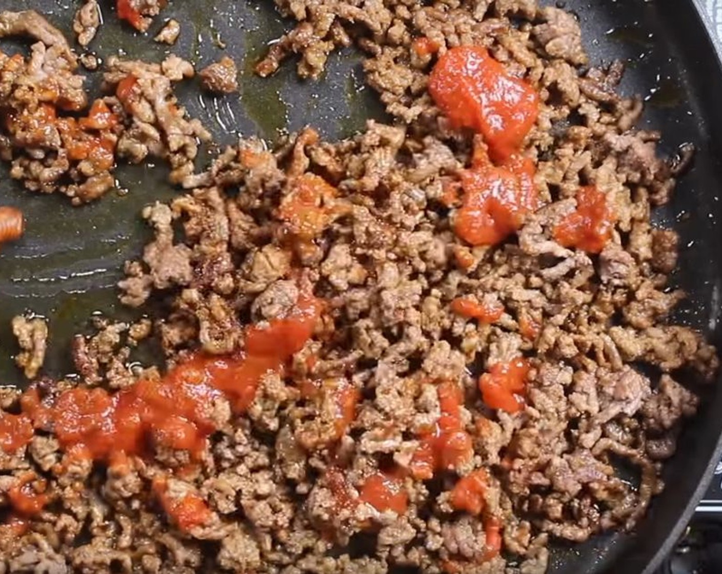 step 3 Add Tomato Paste (4 Tbsp) and mix until warm.