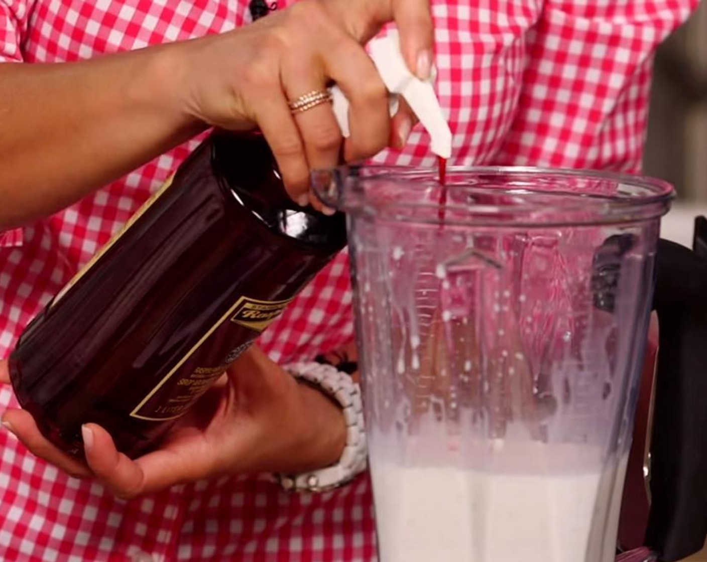 step 1 Add Ice (1/2 cup), Milk (3/4 cup), Vanilla Bean Ice Cream (1 scoop), Granulated Sugar (1 tsp), and Raspberry Syrup (2 drops) to a blender.