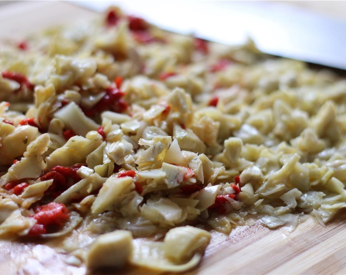 step 1 Finely chop the Marinated Artichokes (4 Tbsp).