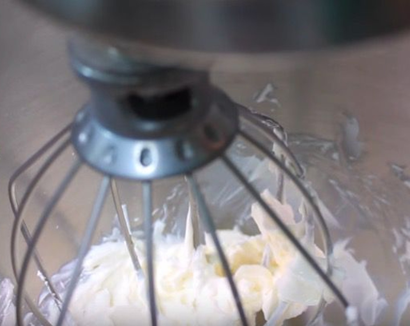 step 7 While the cookies are baking, make the cream cheese frosting. In the bowl of a stand mixer, add Cream Cheese (1/2 cup) and Butter (1 oz) and mix to combine. Add Vanilla Extract (1/2 tsp) and Powdered Confectioners Sugar (2 cups). Mix again until smooth.