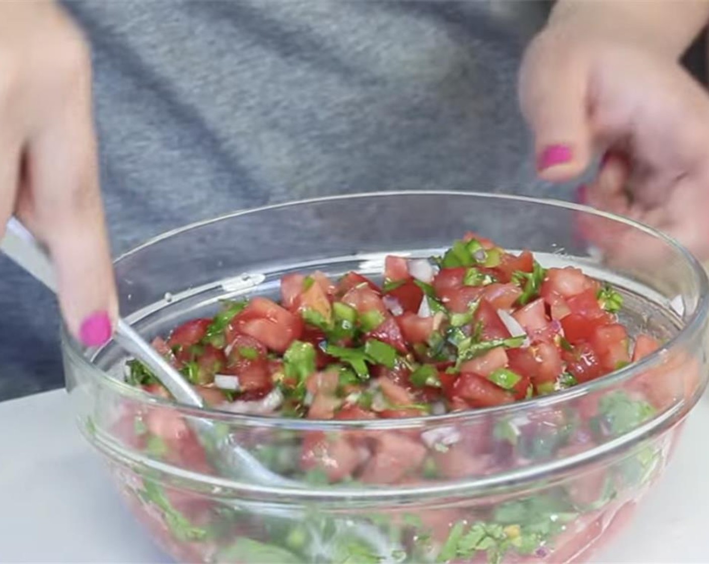 step 5 In a bowl, add the tomatoes, raw onion, chopped cilantro, garlic, Apple Cider Vinegar (2 Tbsp), 2 Tbsp of juice from Limes (2), Olive Oil (1 Tbsp), Agave Syrup (1 tsp), Salt (to taste) and Ground Black Pepper (to taste). Toss and marinate in the fridge for 30 mins.