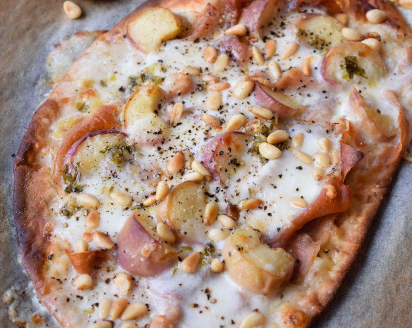 Pizzette with Flat Peaches, Parma Ham and Burrata