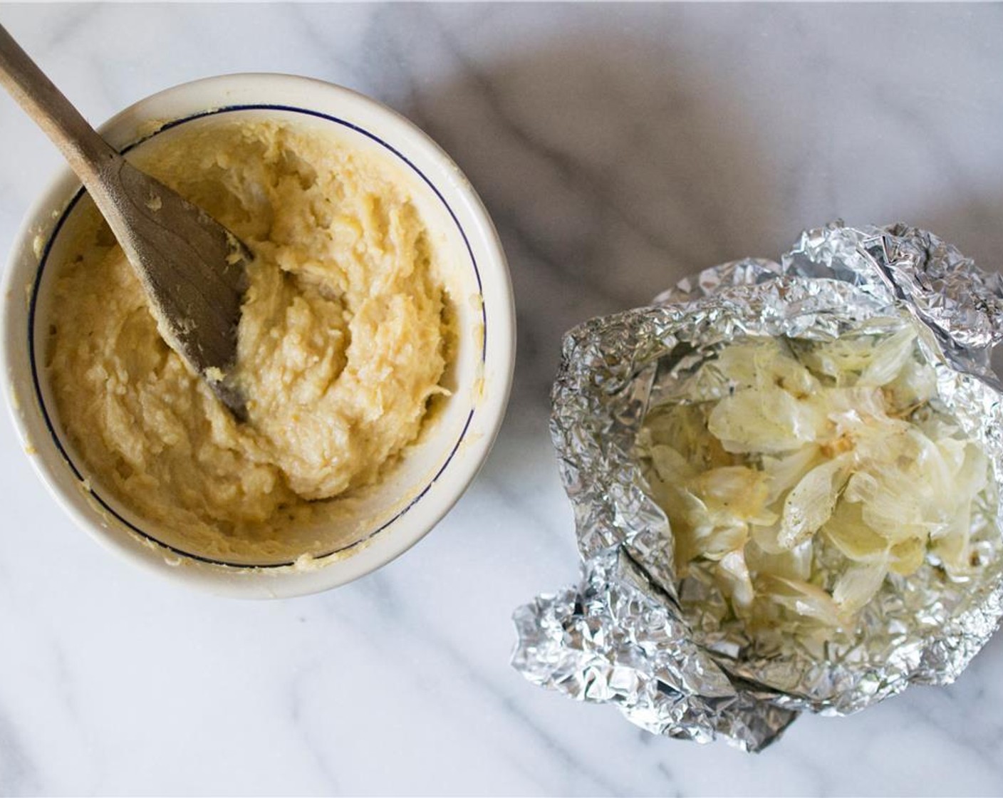 step 5 In a small bowl, combine the unsalted butter, White Miso Paste (4 Tbsp) and roasted garlic. Mix until smooth.