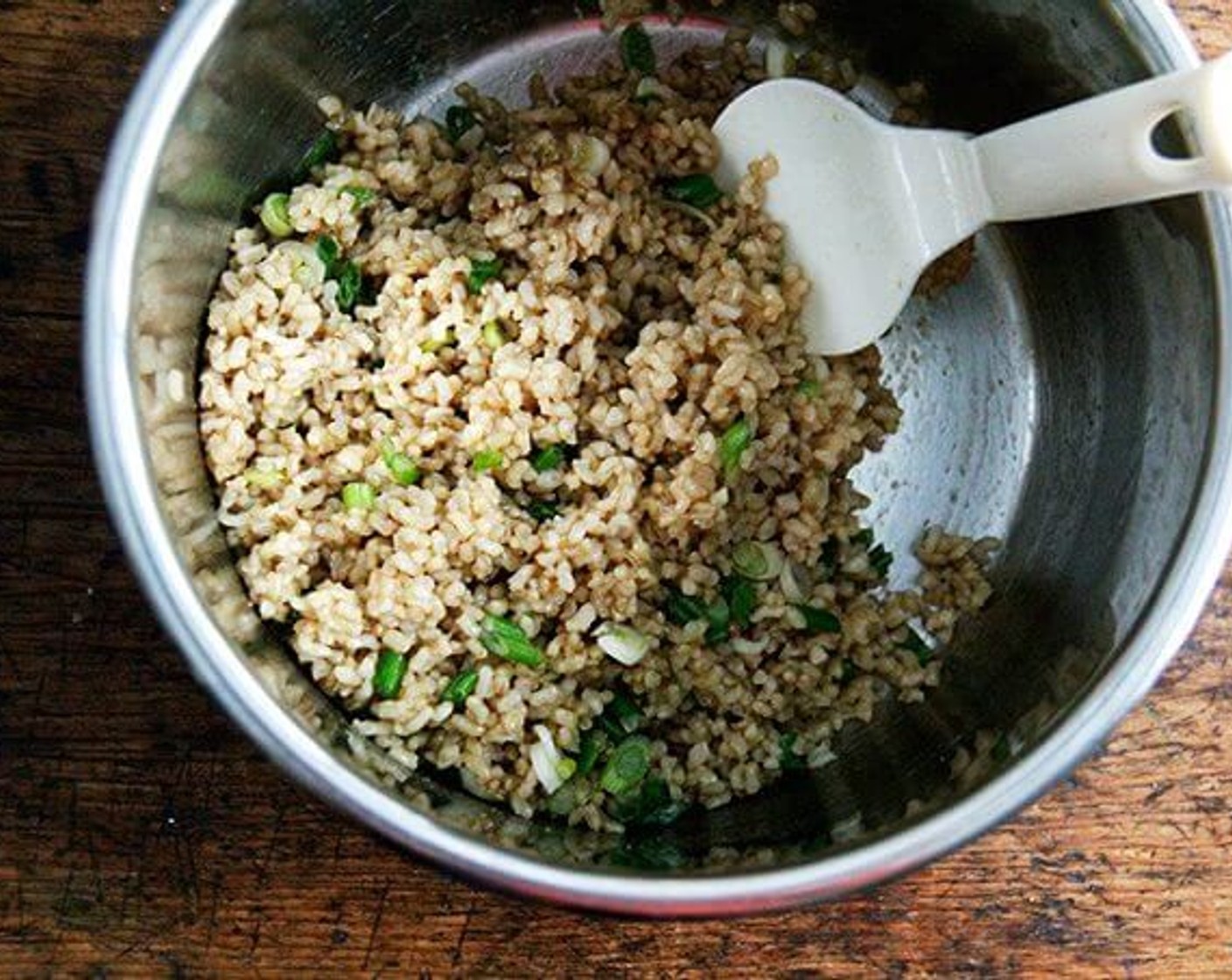 step 2 Add Scallion (1 bunch) to the pot along with Soy Sauce (1 Tbsp), Sesame Oil (2 tsp) and Mirin (1 tsp). Mix them together until combined.