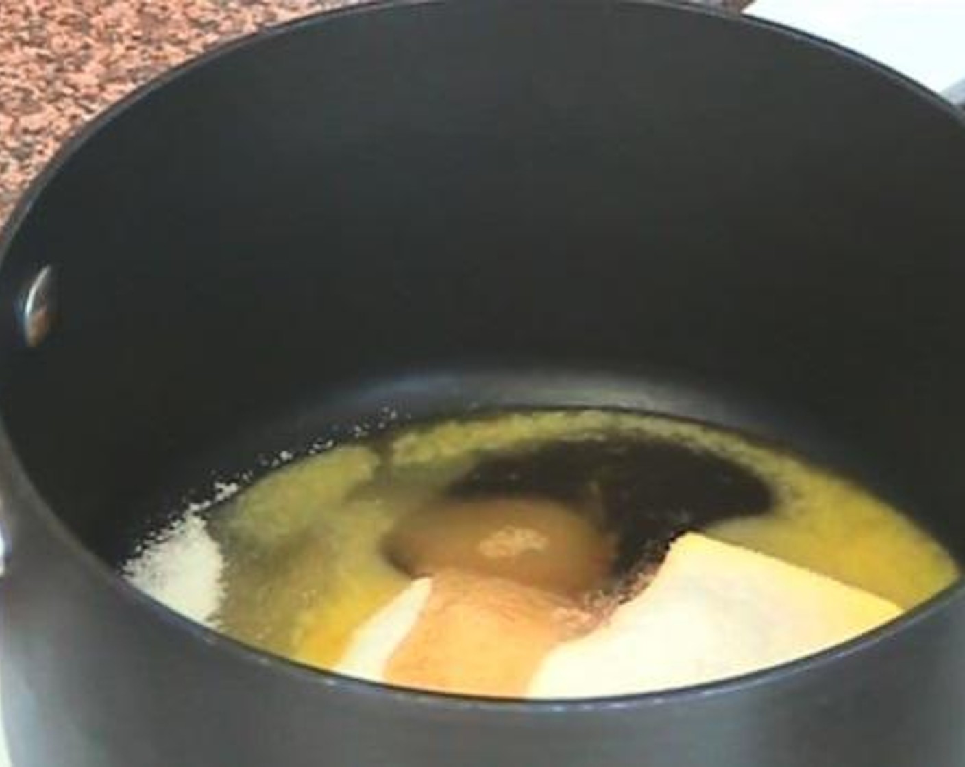 step 1 Into a a saucepan over medium heat, add and mix the Butter (3.5 oz), Caster Sugar (1/3 cup), and Honey (1 Tbsp).