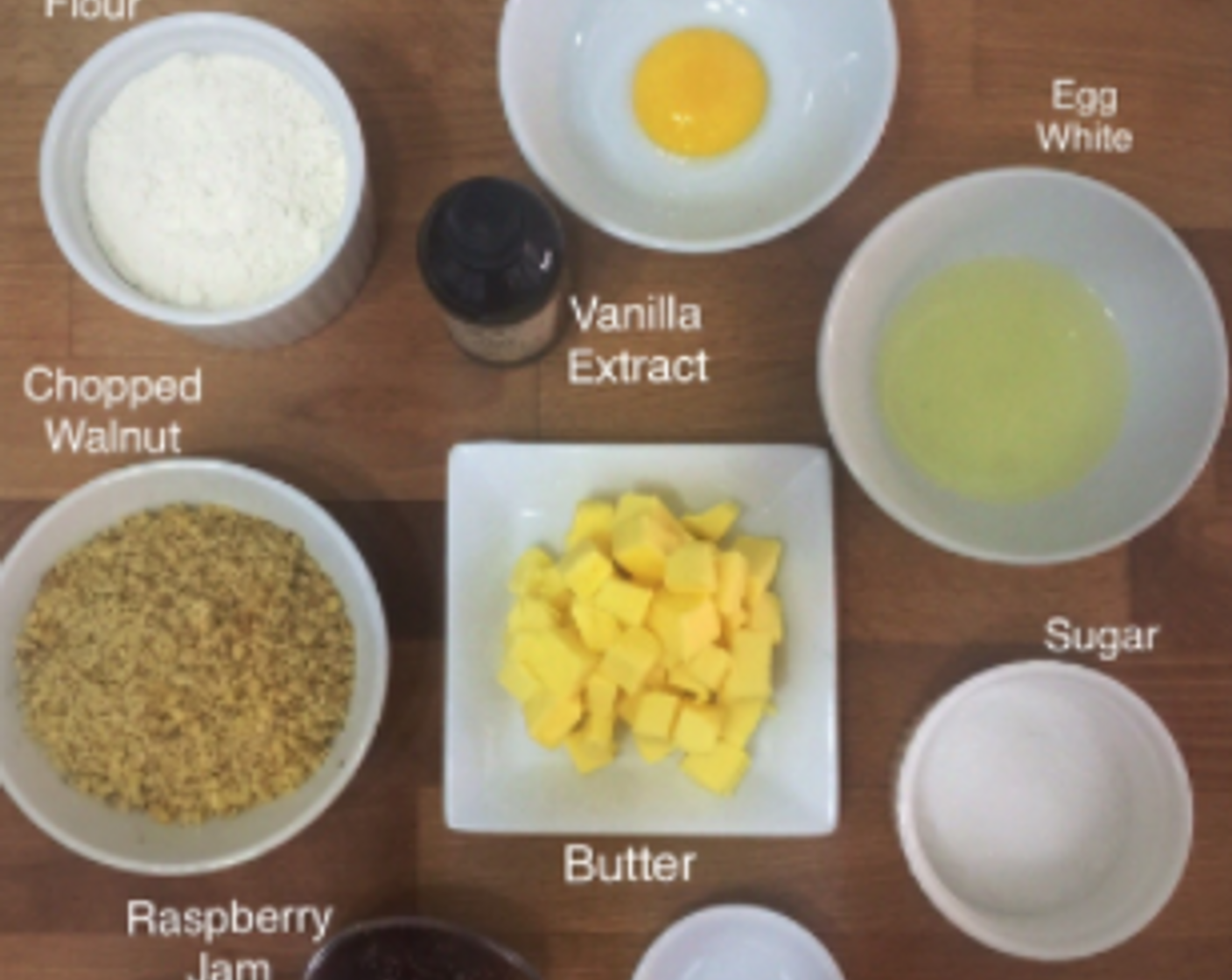 step 1 Start by preparing and weighing all the ingredients needed including All-Purpose Flour (1 cup), Egg (1), Vanilla Extract (1/2 tsp), Walnut (2/3 cup), Butter (4 oz) , Raspberry Jam (4 Tbsp), Salt (1/8 tsp) and Granulated Sugar (4 Tbsp).