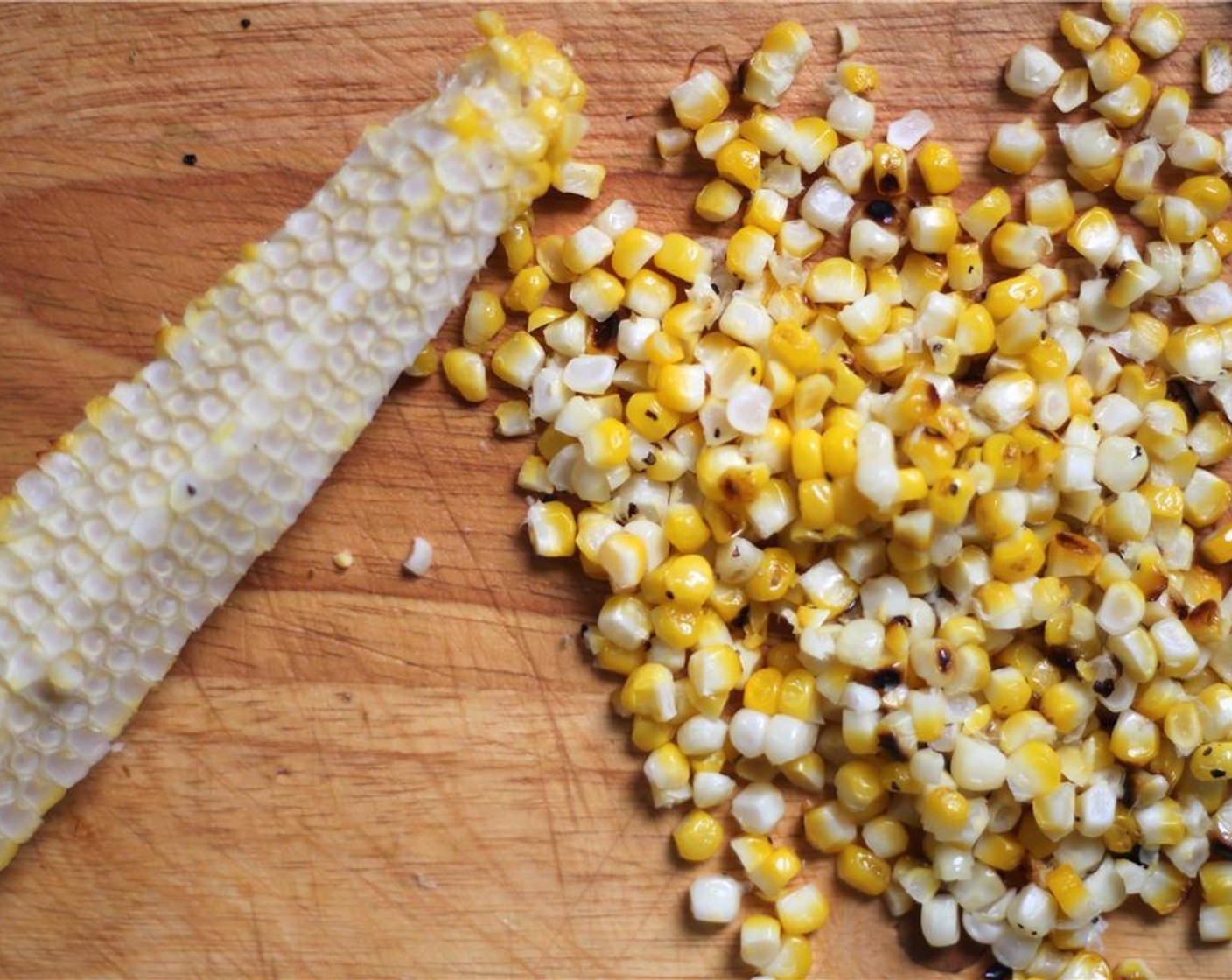 step 4 When the corn is cool enough to handle, slowly cut the kernels off the cob over a large bowl or cutting board. Be warned that kernels will want to fly, so cut slowly. Combine roasted kernels with the other chopped vegetables and Ground Cumin (1/4 tsp), Ground Coriander (1/4 tsp), and Cayenne Pepper (1/4 tsp).