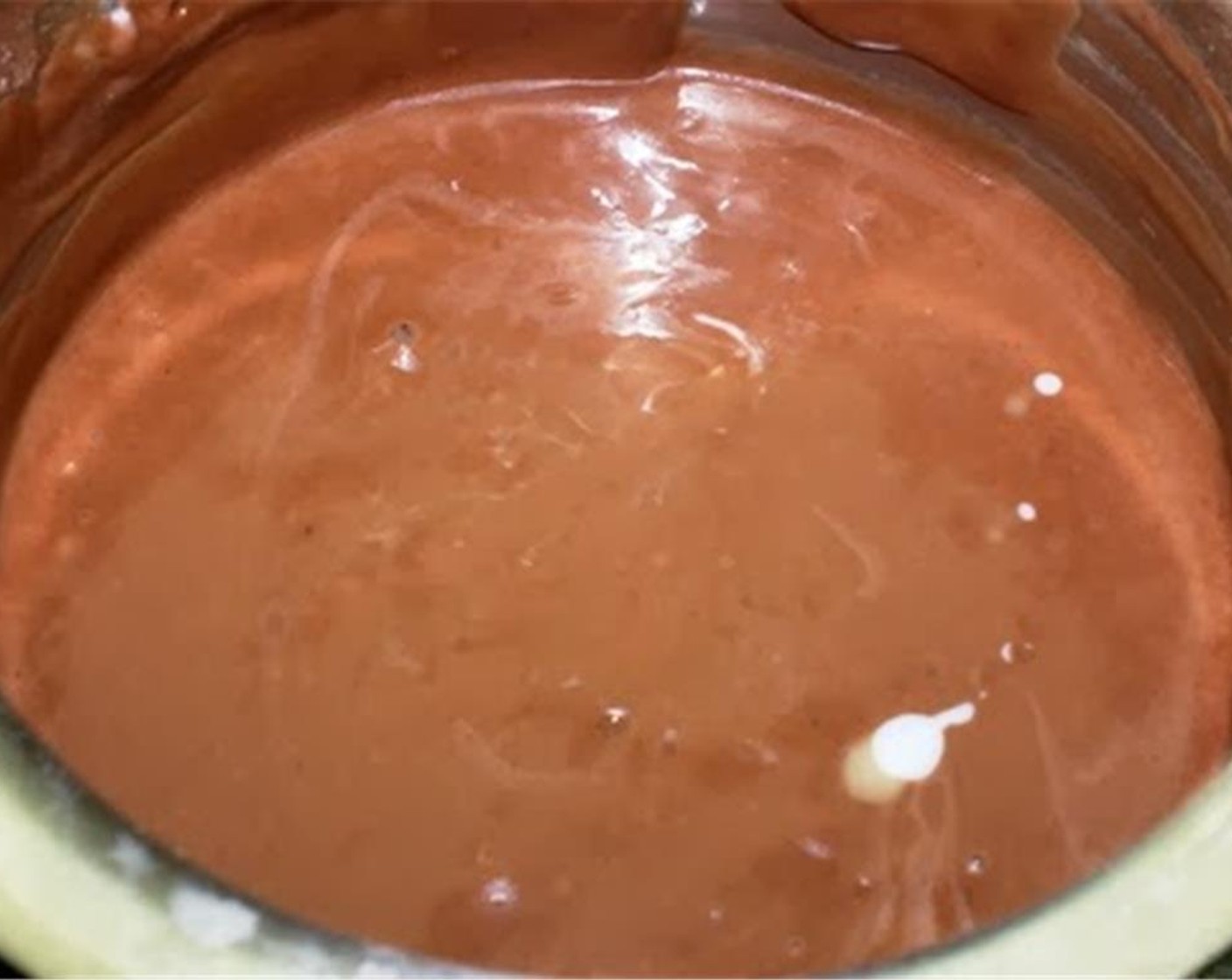 step 4 Add Vanilla Extract (1 tsp) and the Vegetable Oil (4 Tbsp) and mix well.