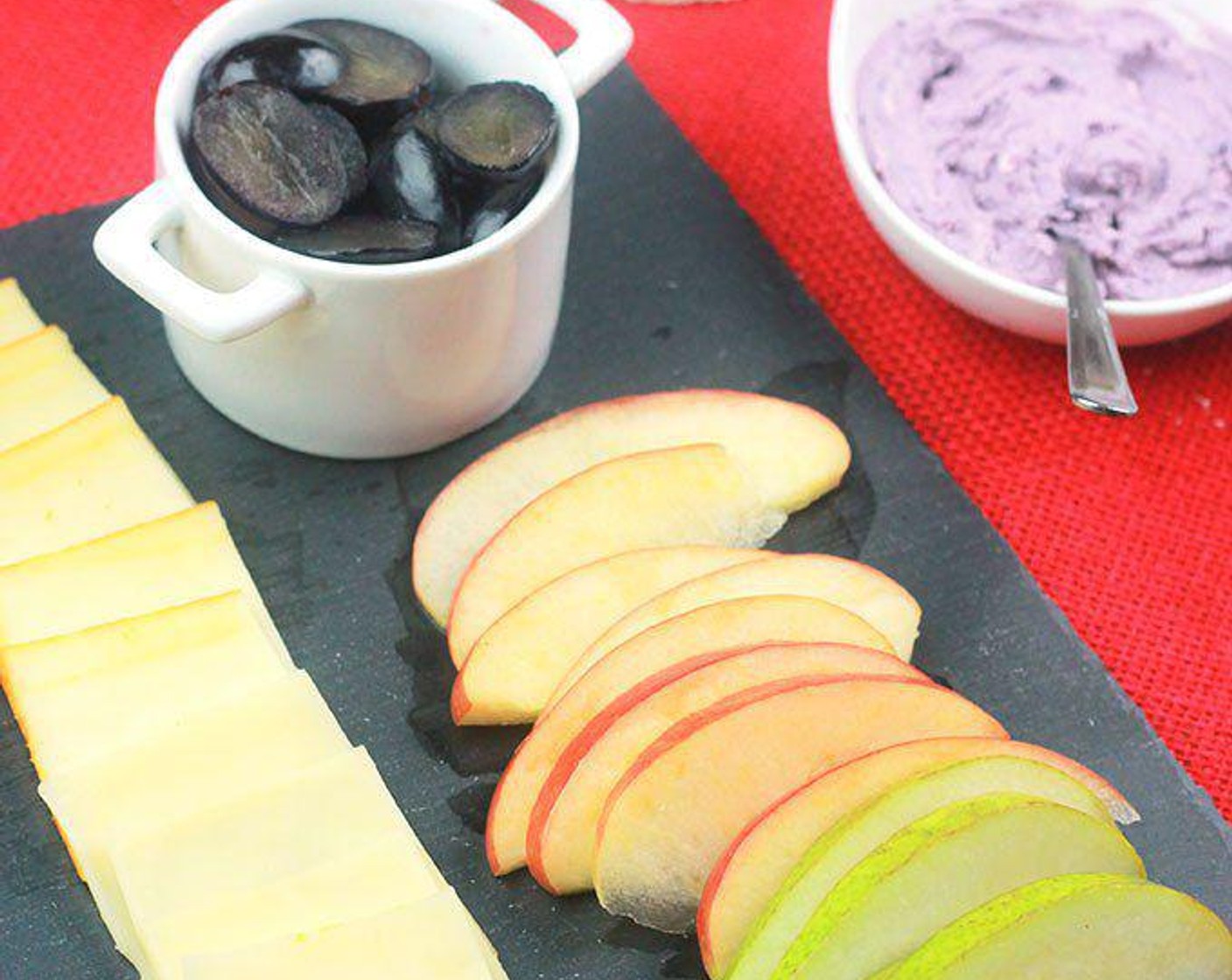 step 3 Assemble crostini ingredients. For spreads, arrange Basil Pesto (to taste), Hummus (to taste), Goat Cheese (to taste), and Fruit Spread (to taste). For herbs, arrange Fresh Basil (to taste), and Fresh Mint (to taste). For fruits and veggies, Apples (to taste), Pears (to taste), Cherry Tomatoes (to taste), Cucumbers (to taste), Radishes (to taste), and Grapes (to taste). For extras, Cheese (to taste), Crushed Red Pepper Flakes (to taste), and Sea Salt (to taste).