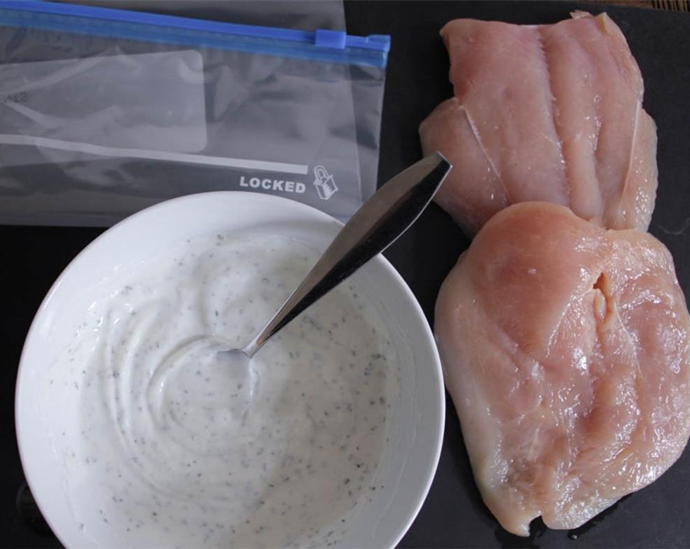 step 1 In a small bowl, combine the Nonfat Plain Greek Yogurt (2/3 cup), Salt (1/2 tsp), Garlic Powder (1/4 tsp), Dried Basil (1/2 tsp), Dried Oregano (1/2 tsp), and Ground White Pepper (1/8 tsp).