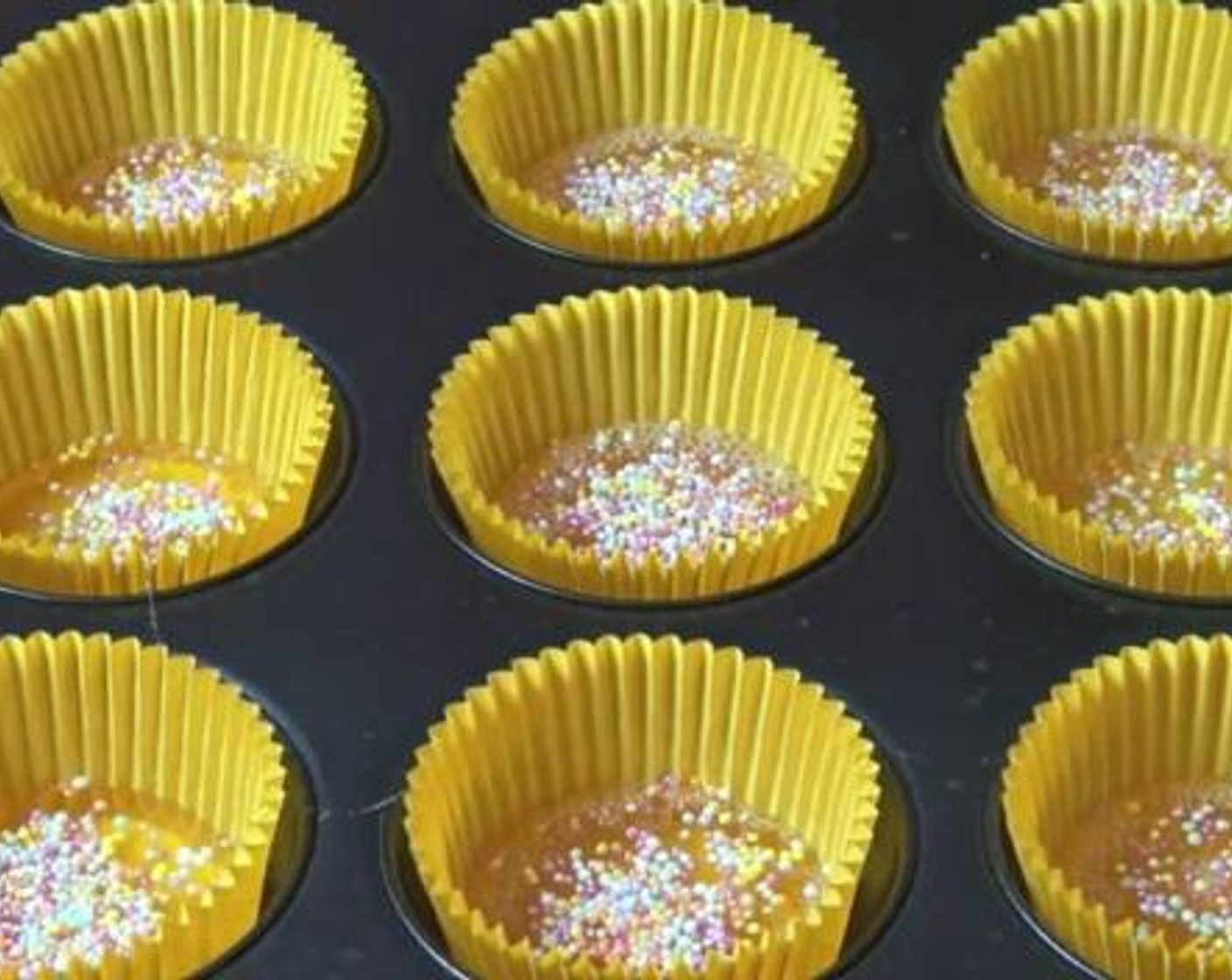 step 2 Pour the toffee into paper cases inside a muffin pan. Sprinkle over with some Sprinkles (2 Tbsp), and set aside for about half an hour.