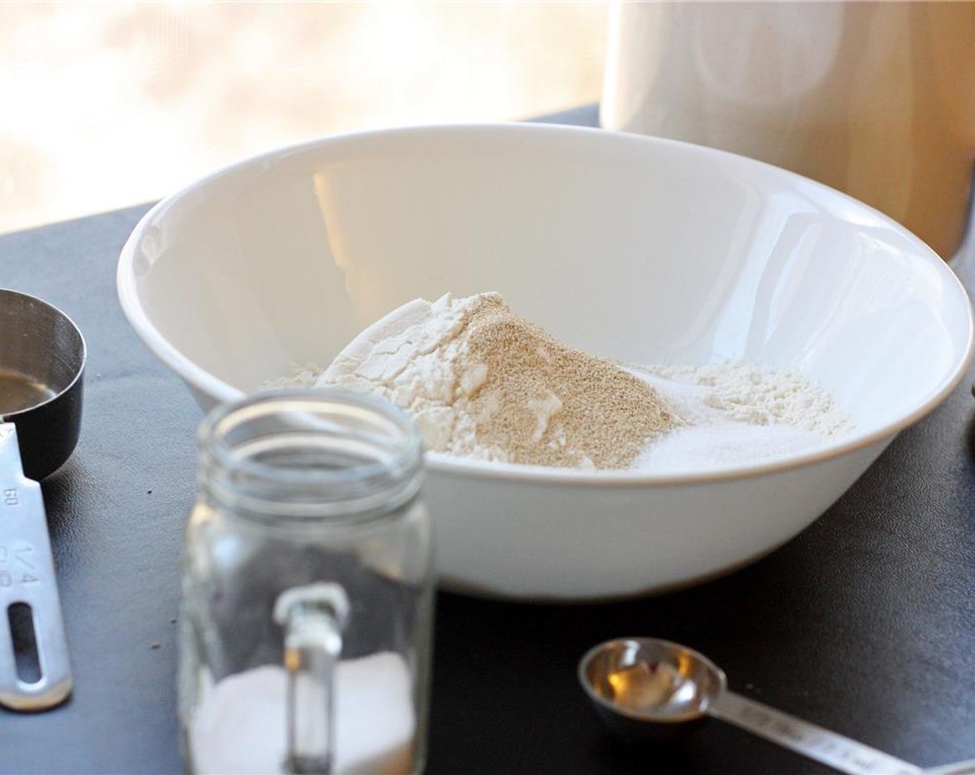 step 3 Sift together the All-Purpose Flour (1 1/2 cups), Granulated Sugar (1 Tbsp), Instant Dry Yeast (1 tsp), and Salt (1/2 tsp) into a large bowl.
