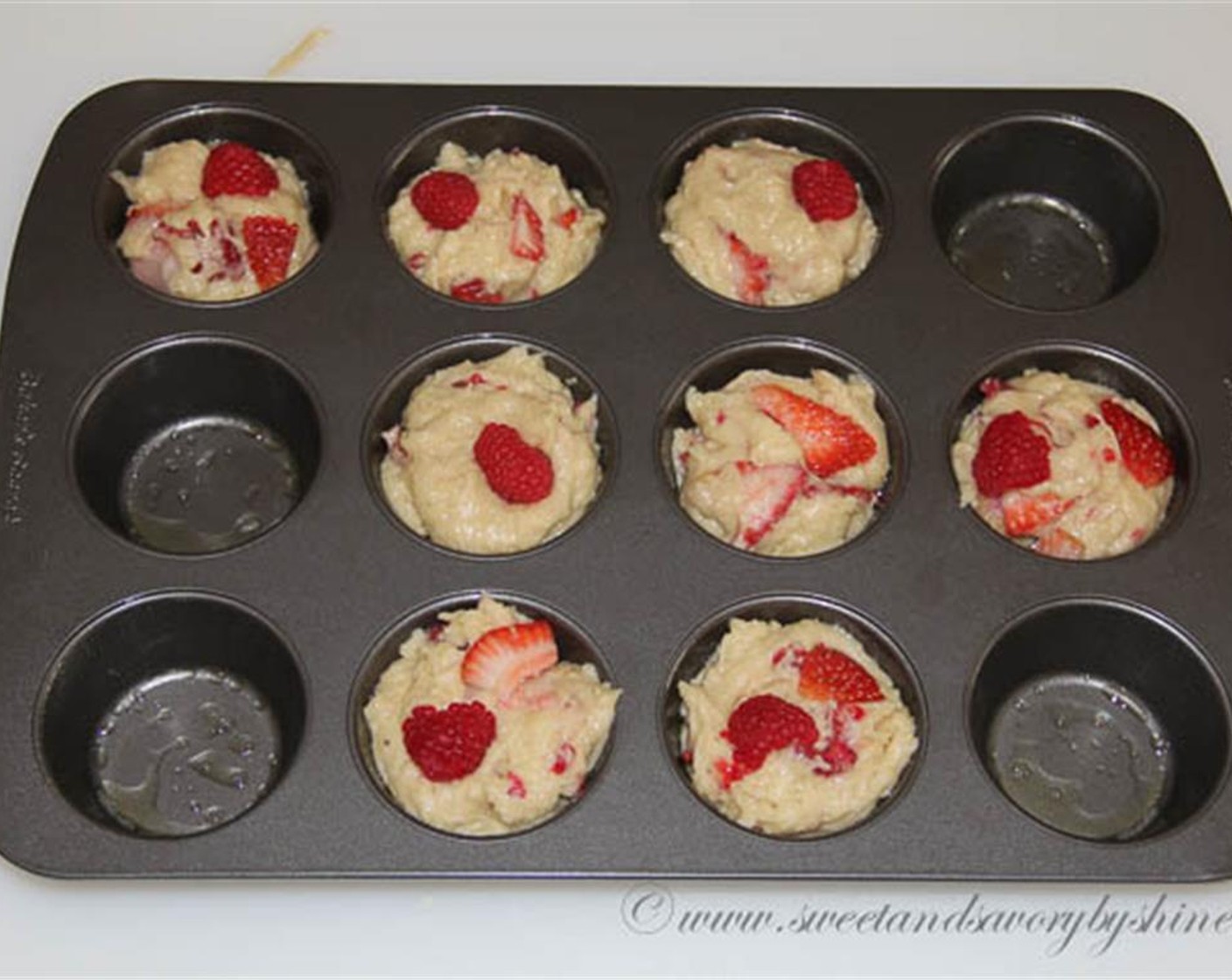 step 5 Spoon the batter into 8 greased muffin cups filling to the top. Bake for about 15-18 minutes, or until an inserted toothpick comes out clean. Cool on wire rack for 5 minutes, and then remove the muffins from the pan to cool completely.