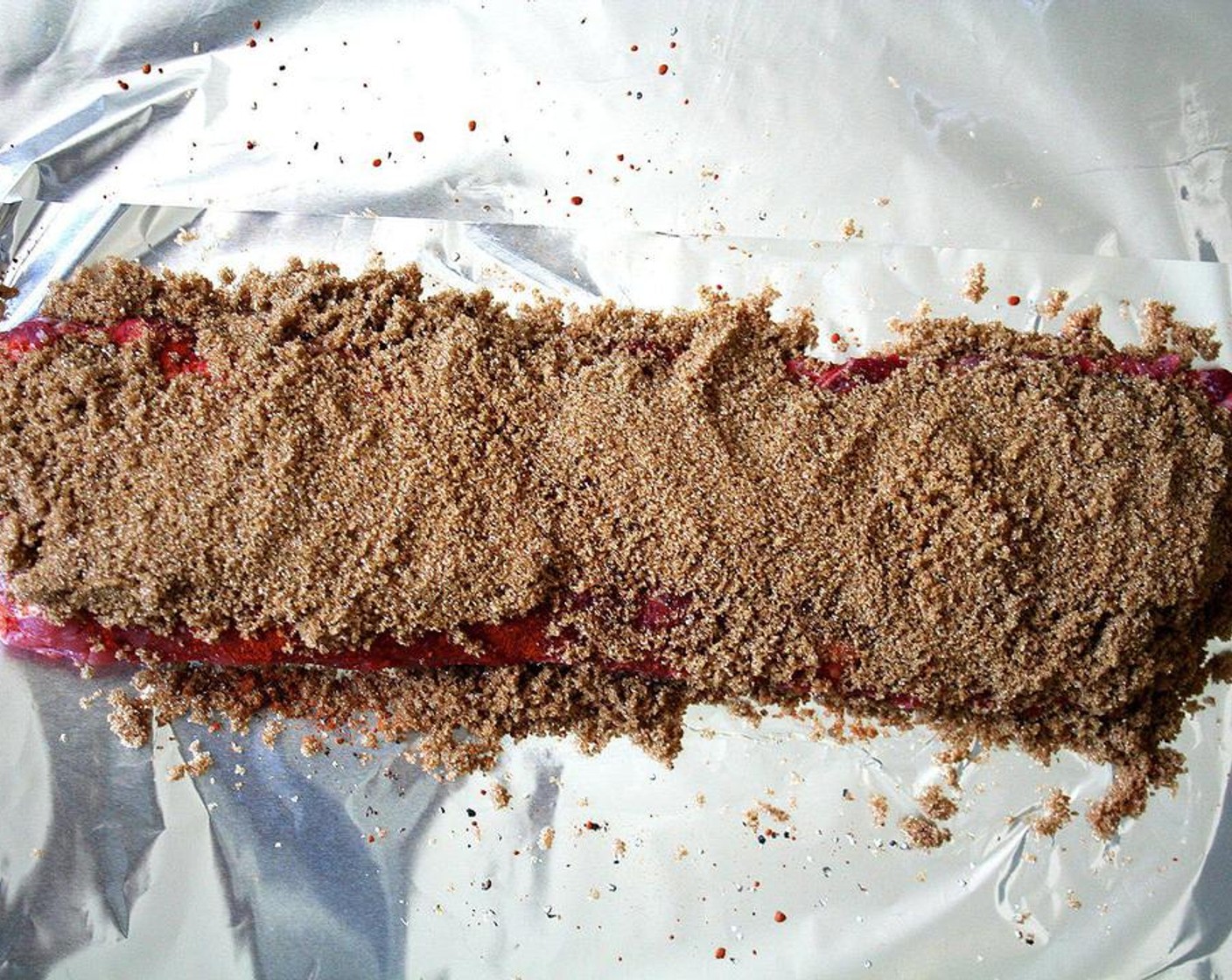 step 2 Rinse off the Pork Baby Back Ribs (1 rack) and pat dry. Liberally coat the ribs with Kosher Salt (to taste), Freshly Ground Black Pepper (to taste) and Smoked Paprika (to taste). Pack on Brown Sugar (1 cup).