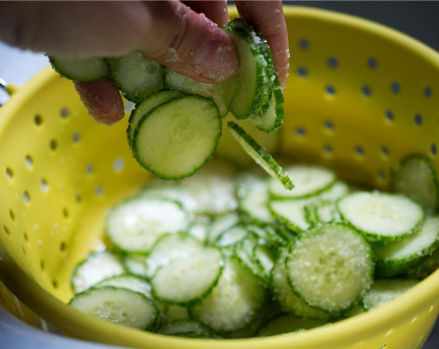 step 3 Sprinkle with Kosher Salt (1 Tbsp), tossing the cucumber slices to coat (this will draw out the moisture). Allow to sit for 20 minutes.