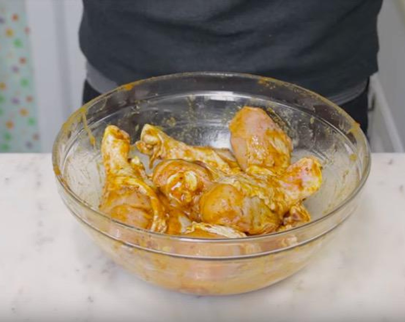 step 1 Add Chicken Drumsticks (2.5 lb) to a large bowl. Add Butter (4 Tbsp), Cajun Seasoning (2 Tbsp), Onion Powder (1 tsp), Garlic Powder (1 tsp), Salt (1 tsp), Ground Black Pepper (to taste), and juice of the Limes (2). Using hands or a large spoon, mix everything together until chicken is well coated.
