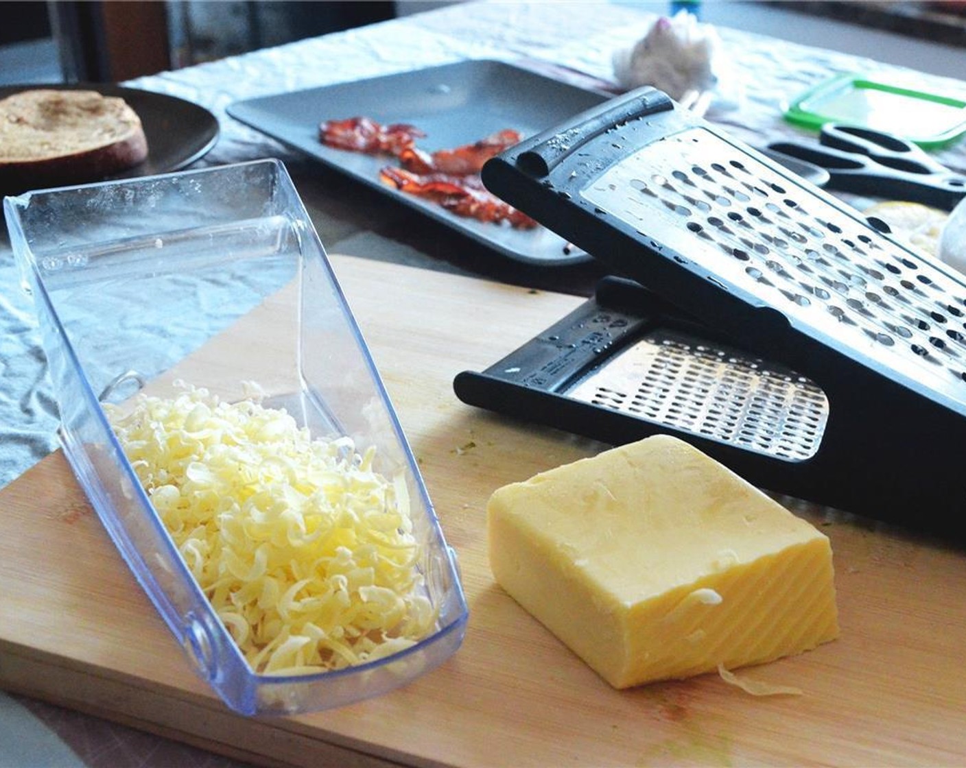 step 5 Grate the Mozzarella Cheese (3/4 cup) and Parmesan Cheese (4 Tbsp), and set aside.