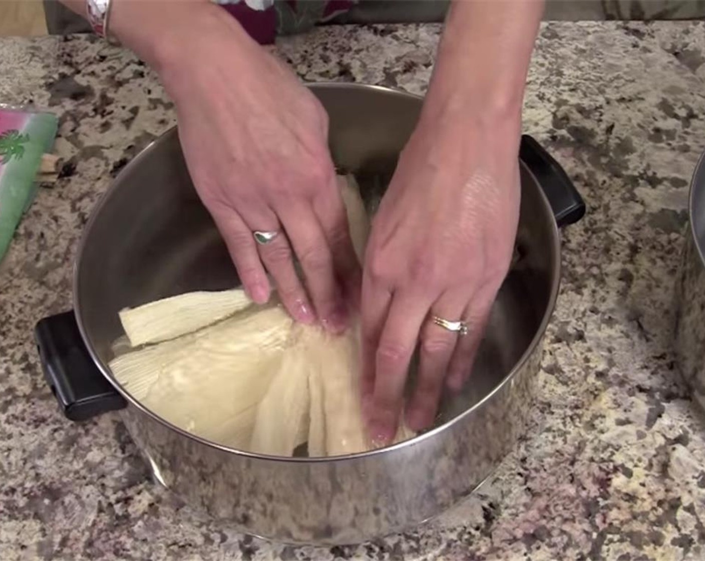 step 5 Soak Corn Husks (to taste) in hot water for 30 minutes, or until they become pliable. Gently separate the husks so as to not tear them. If some are torn, you can use two husks and overlap them before putting masa on them.
