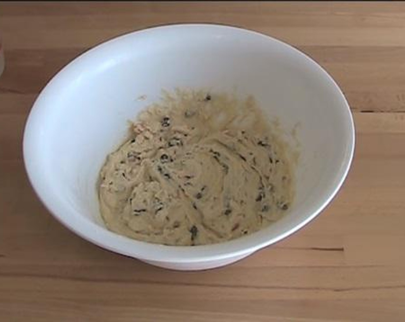 step 3 Into a jar, add and mix the Milk (3/4 cup), and Egg (1). Pour the mixture into the dry ingredients and combine everything well.