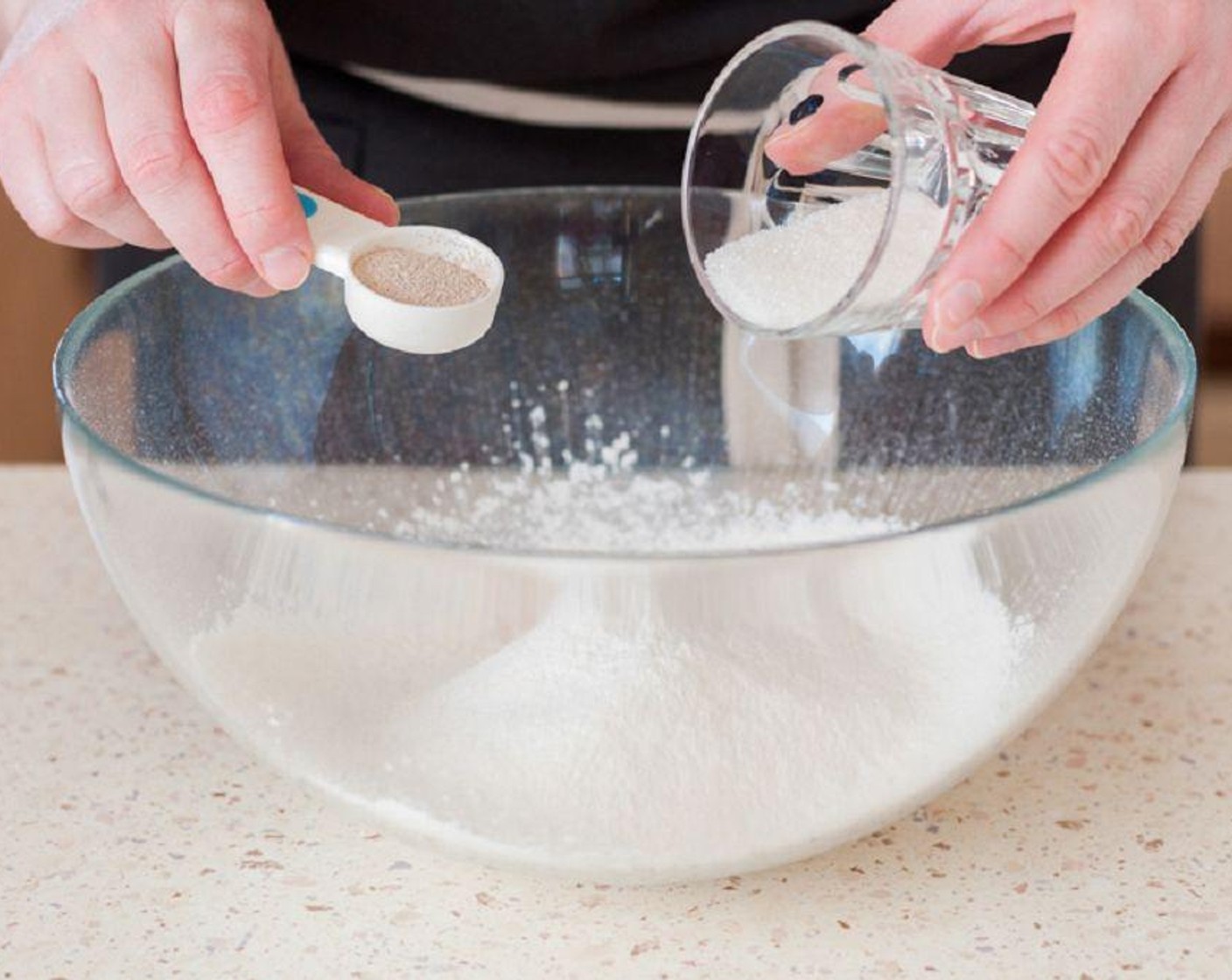 step 1 In a large mixing bowl, combine warm Milk (2 1/2 cups) and Granulated Sugar (1 Tbsp). Sprinkle Active Dry Yeast (1 Tbsp) on top, stir gently, and let it sit for 10 minutes until foamy.
