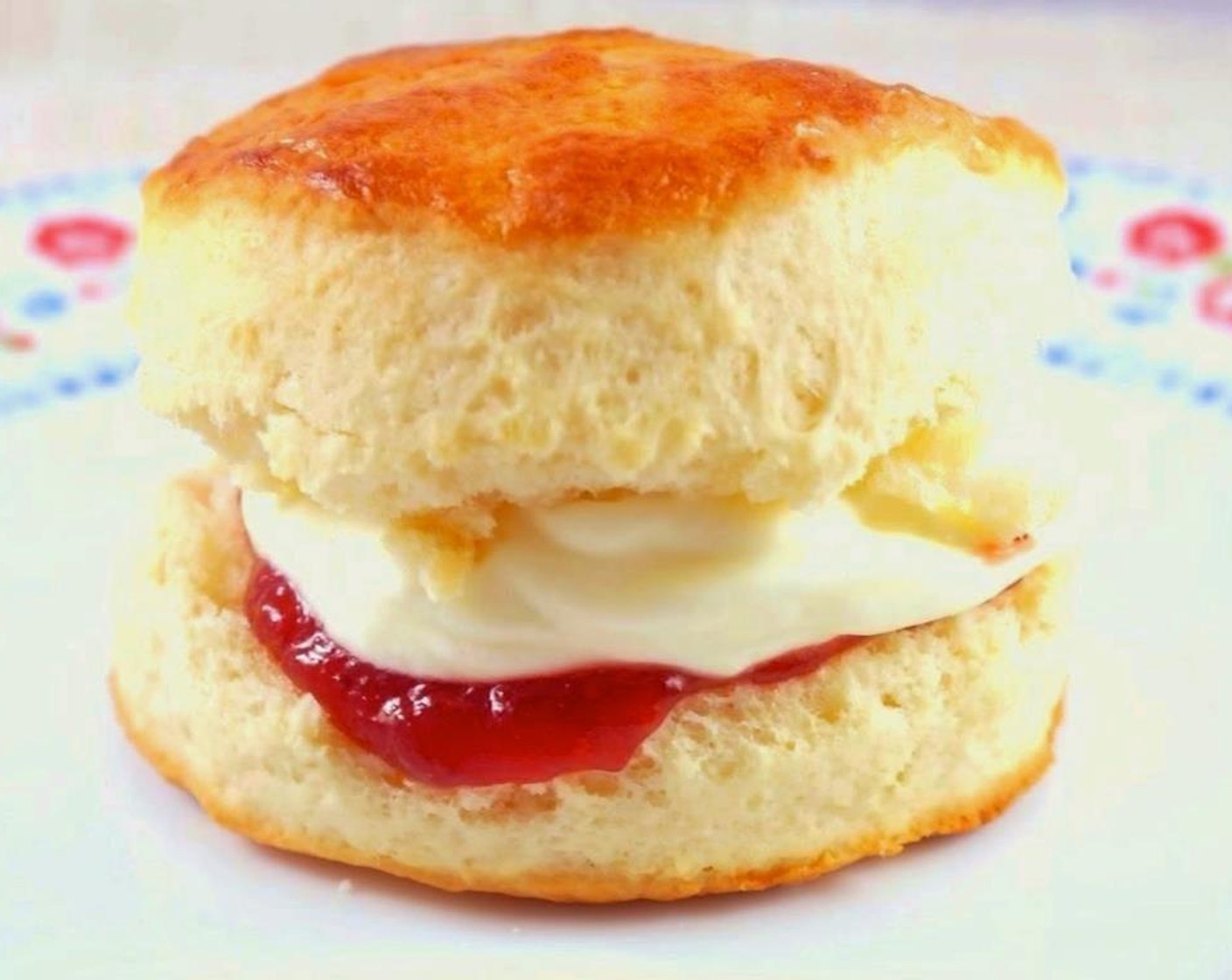 step 5 Bake for 13-15 minutes until the top reaches a golden brown color, transfer to wire rack to cool down. Serve with Whipped Cream (to taste) and your favorite Fruit Jam (to taste). Bon appetite!
