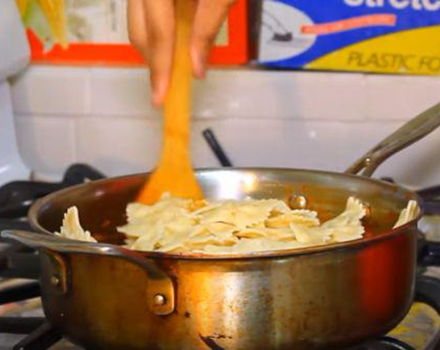 step 5 Add the pasta back into the sauce and stir. Add the Parmesan Cheese (4 Tbsp).