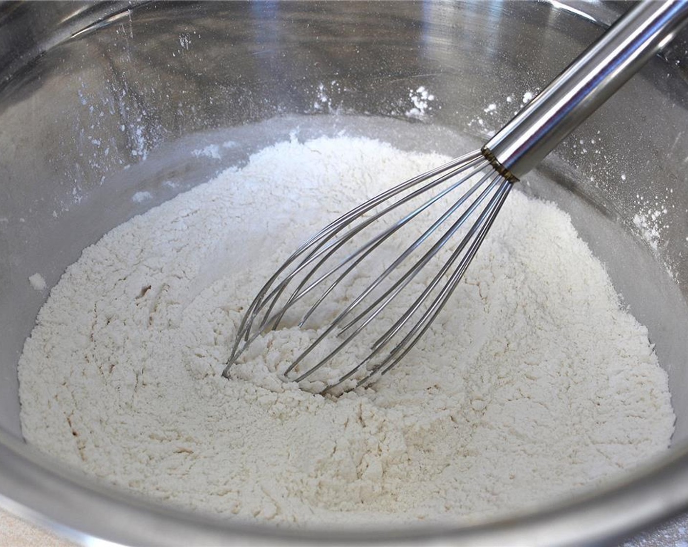 step 1 Preheat oven to 375 degrees F (190 degrees C). In a medium size bowl, mix the dry ingredients: All-Purpose Flour (2 cups), Salt (1/2 tsp) and Baking Soda (2 tsp) together.
