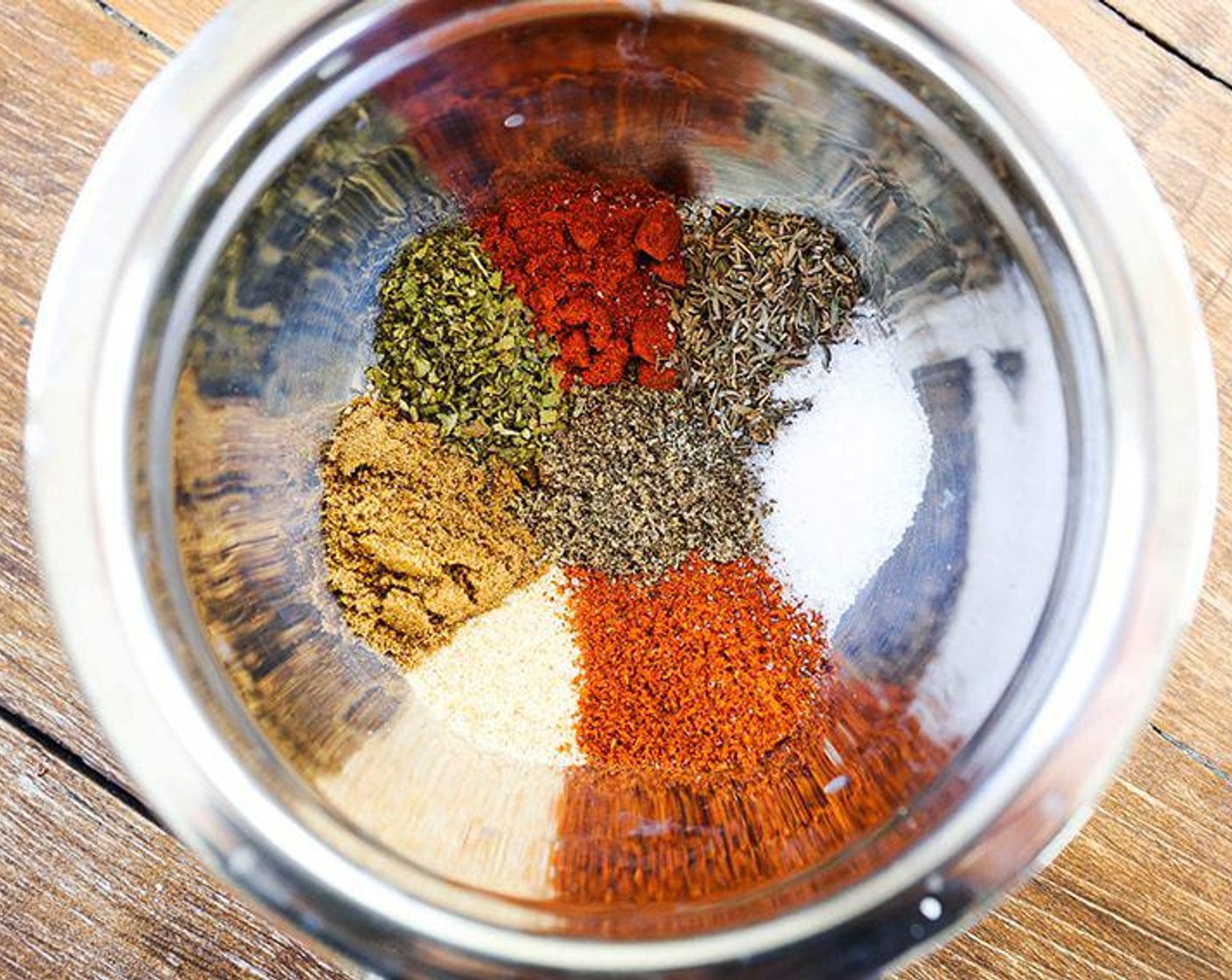 step 3 In a small bowl, combine the Garlic Powder (1 tsp), Dried Oregano (1 tsp), Ground Cumin (1 tsp), Dried Thyme (1 tsp), Paprika (1 tsp), Salt (1 tsp), and Ground Black Pepper (1 tsp). Mix well.