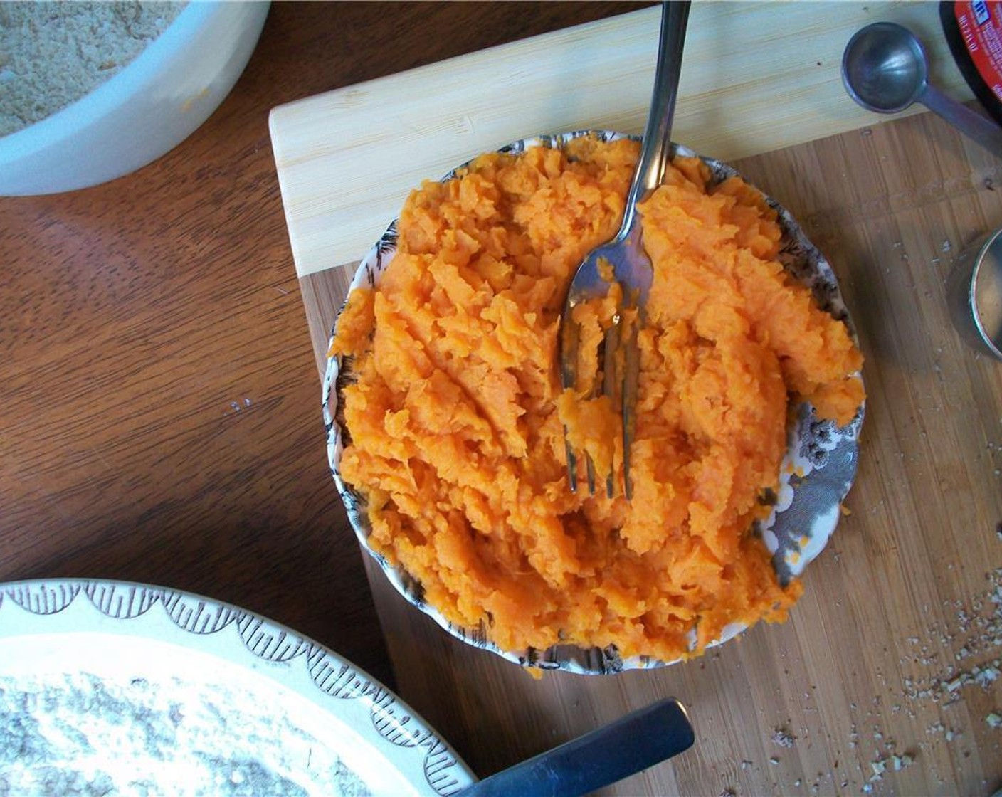 step 3 In a separate bowl, combine mashed Sweet Potato (1 cup), Granulated Sugar (4 Tbsp), Brown Sugar (4 Tbsp) and Vanilla Extract (1/2 tsp).