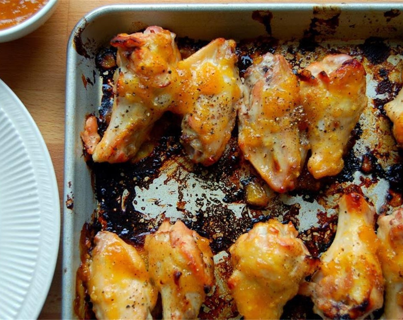 step 5 Place under the broiler. Broil on high for 3 minutes. Take out of the oven and flip the wings over. Put back in the oven and broil for 3 minutes longer.