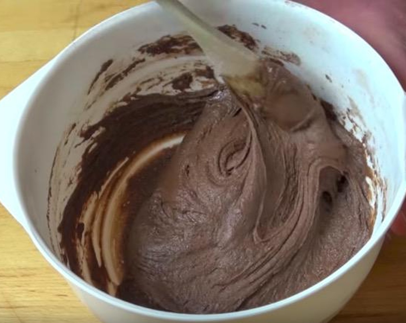 step 1 Put All-Purpose Flour (1 cup), Caster Sugar (1/3 cup), Baking Powder (1 tsp), Unsweetened Cocoa Powder (2 Tbsp) into a mixing bowl and mix it together. Make a well in the center and add Milk (4 Tbsp), Butter (2 oz), Egg (1) mix together until smooth.