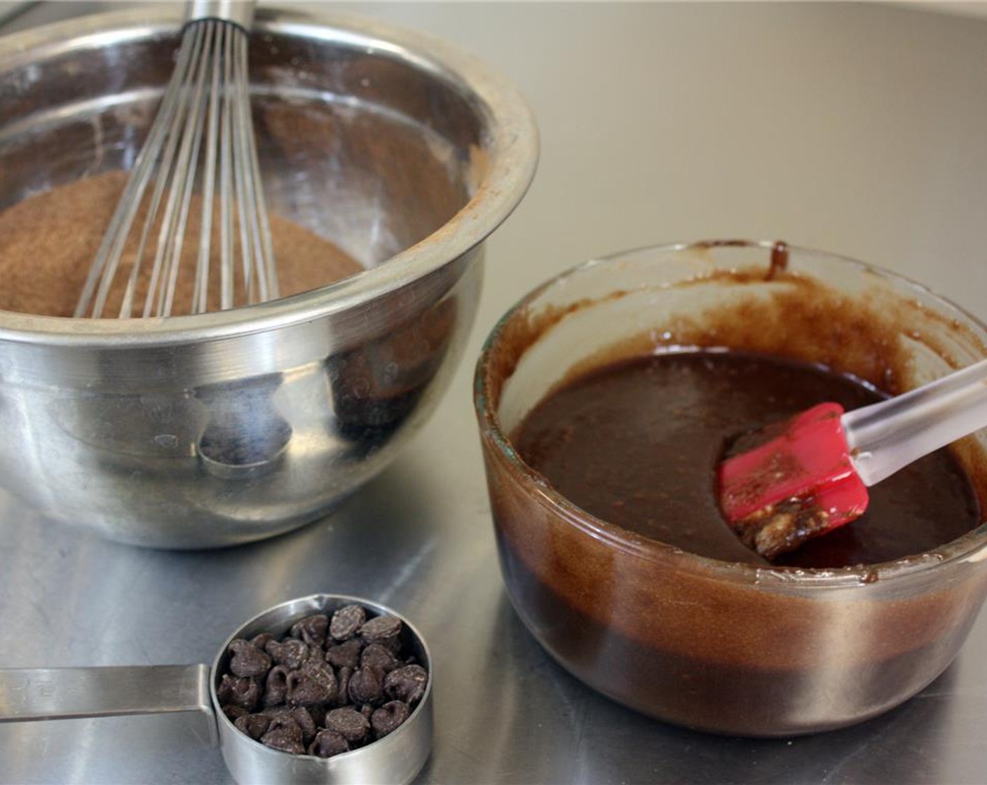 step 8 Stir the Granulated Sugar (1 cup) into the melted chocolate mixture, followed by the Rice Milk (4 Tbsp), Vanilla Extract (1 tsp), and flax mixture. Whisk well to combine.