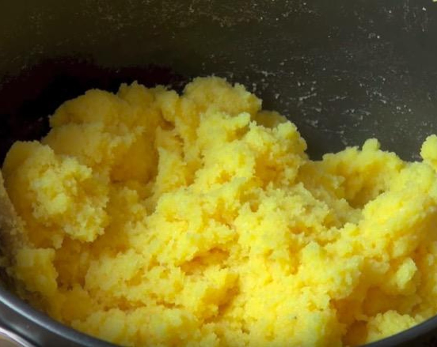 step 1 Add Chicken Stock (2 cups), Water (2 cups) into a large saucepan. Turn to high heat and once it's boiling, add Polenta (2 cups) and whisk it to make sure it's nice incorporated in the stock. Reduce the heat to low and stir this with a wooden spoon for about 10 minutes or until it's soft.