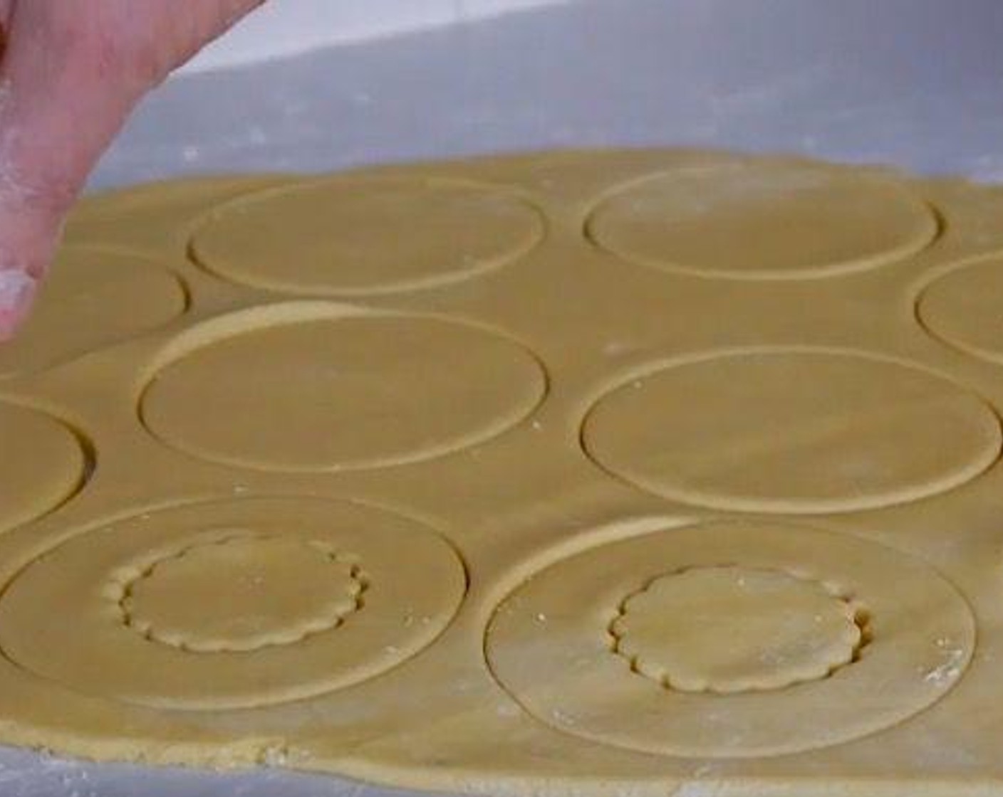 step 4 On a floured surface make the dough into a ball and then extend using a rolling pin until the dough is approx 0.4-cm to 0.5-cm thick.
