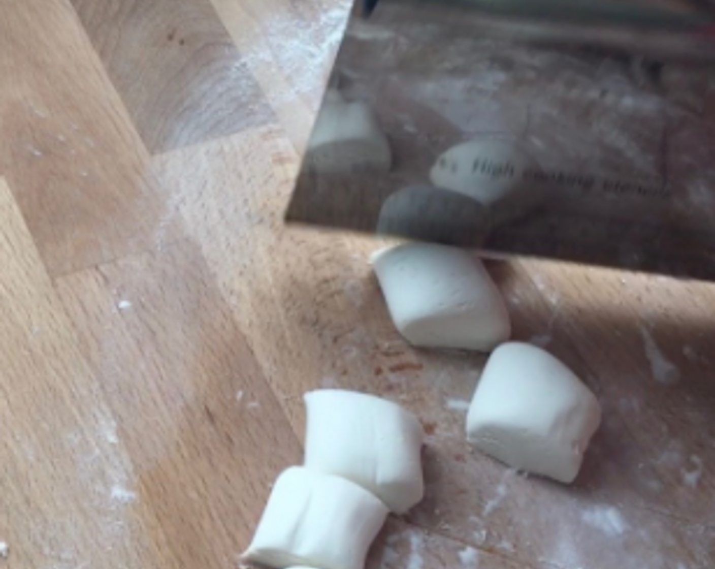 step 18 Take one half and roll into a log and cut into pieces, 20g each.