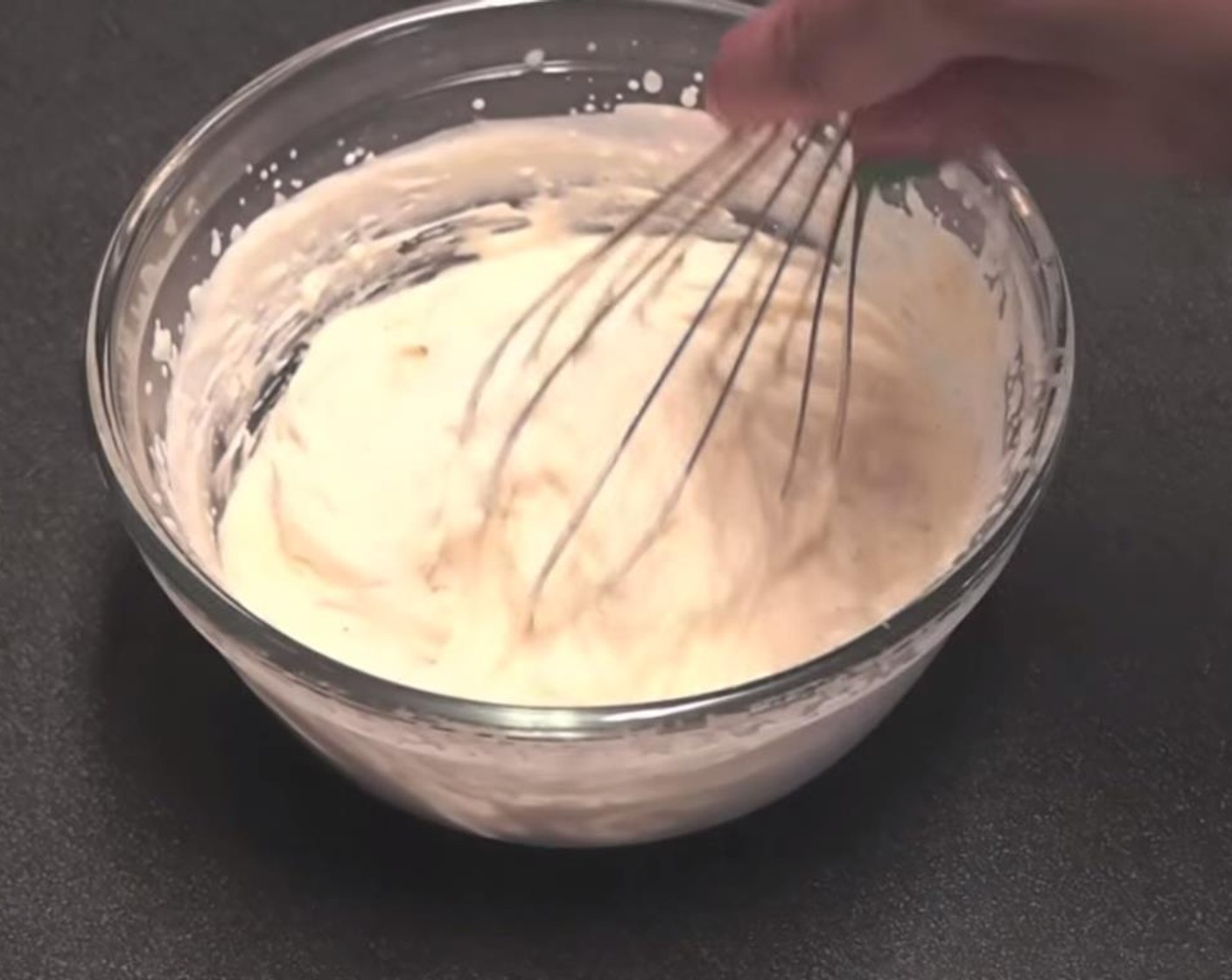 step 7 To make the whipped cream topping, whip together the Heavy Cream (4 Tbsp) and 3 tablespoons of pumpkin spice syrup until it reaches stiff peaks.