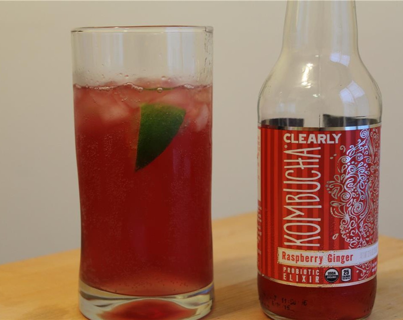 step 3 Add Vodka (4 fl oz), Clearly Kombucha® Raspberry Ginger (12 fl oz), and Peychaud's Bitters (4 dashes) and stir. Enjoy!