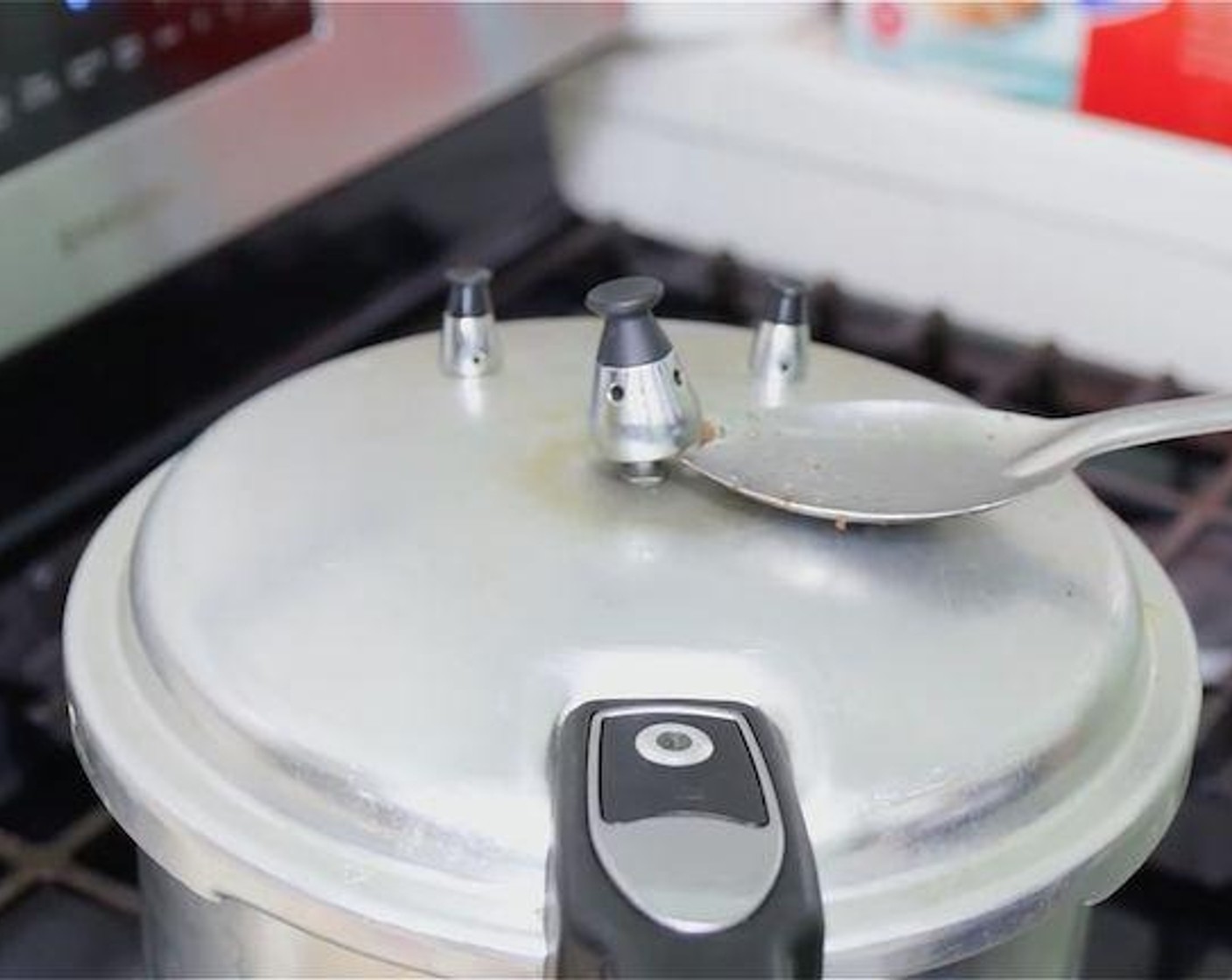 step 4 To release the pressure, move the pressure cooker from the stove to the sink and run cold water over the the lid until all the pressure is released, DO NOT OPEN until there’s no more air coming out of the top.