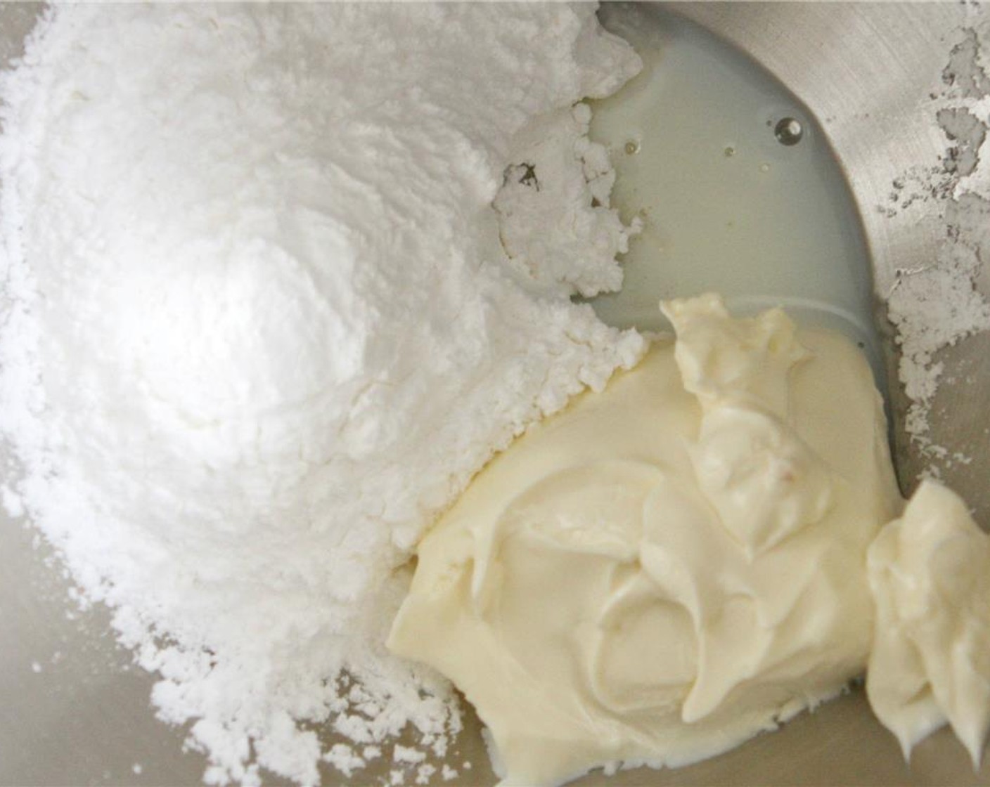 step 1 In a small bowl, combine Powdered Confectioners Sugar (1 cup), Cream Cheese (1/2 cup), and Milk (1 cup). Stir until creamy, adding an additional tablespoon of milk, if needed. Set aside, this will be your glaze for later.