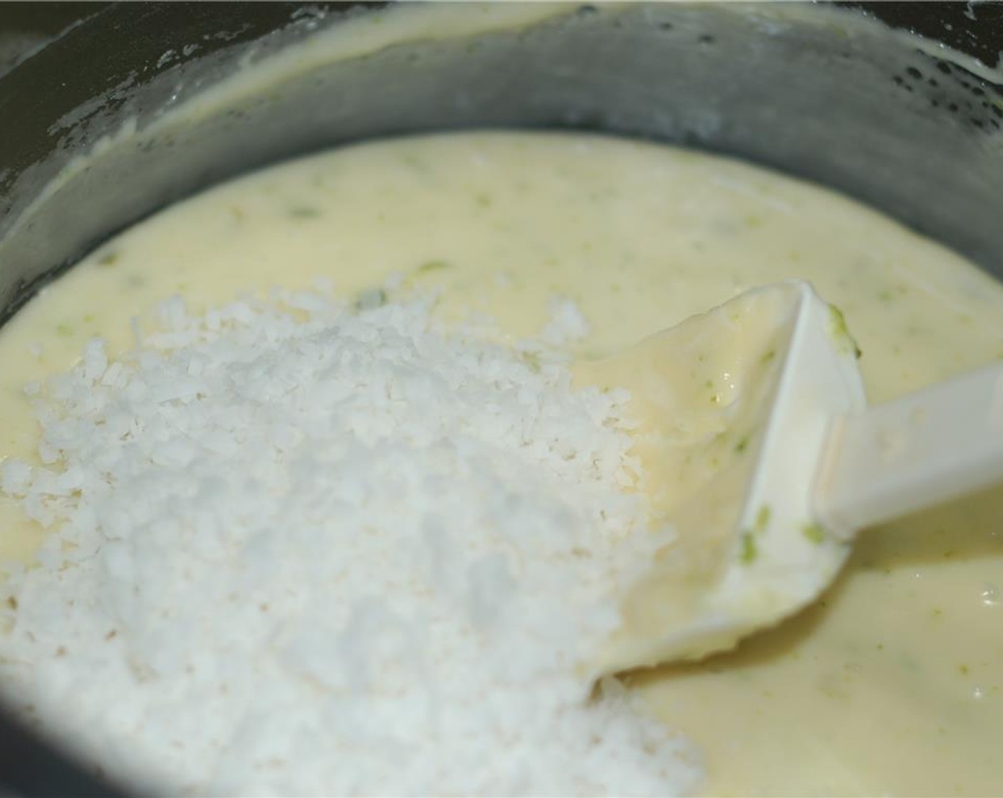 step 6 Next, add in the Unsweetened Shredded Coconut (1/2 cup) and stir until all incorporated.