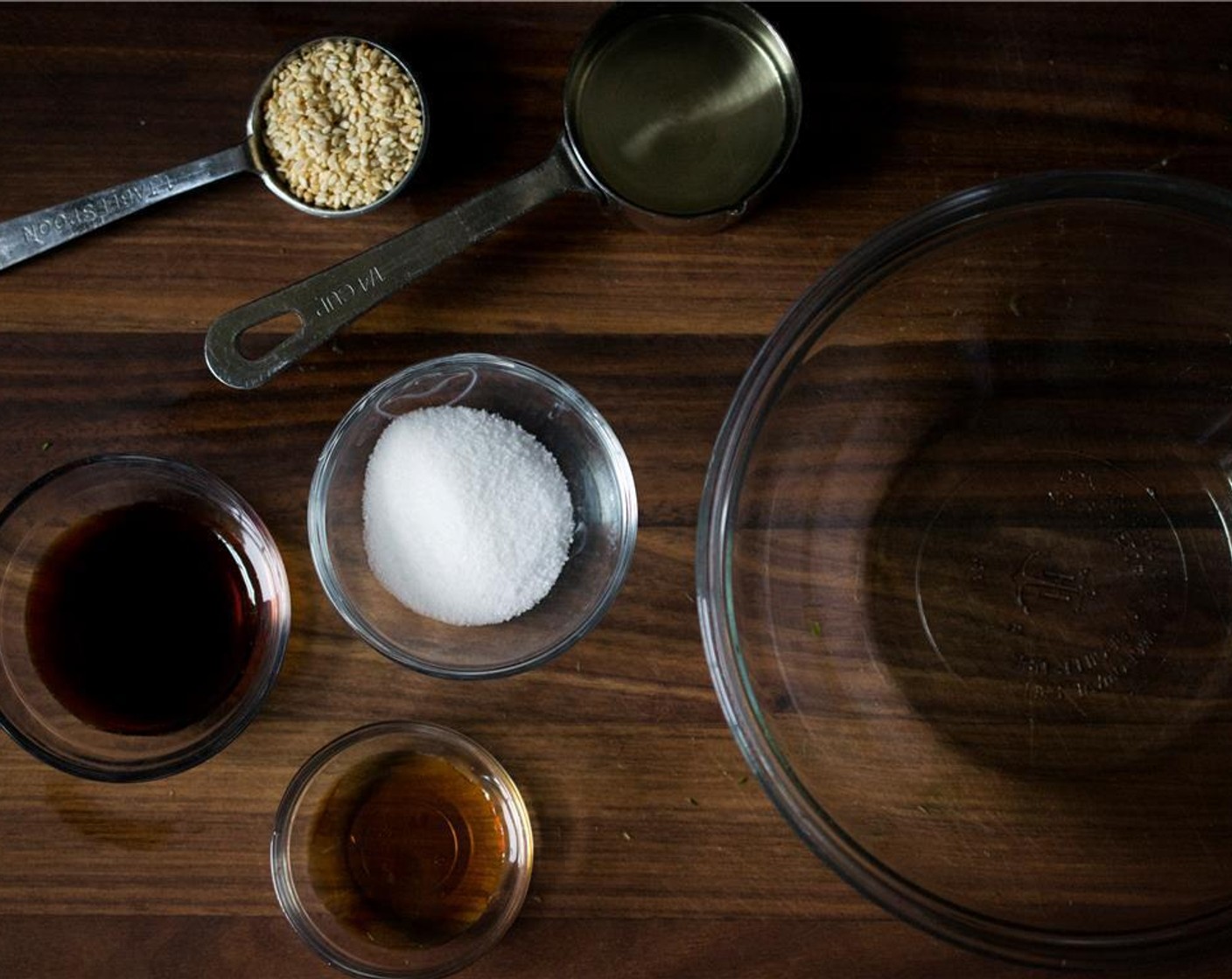 step 5 In a medium bowl, add the Rice Vinegar (4 Tbsp), Soy Sauce (1 Tbsp), Granulated Sugar (2 tsp), and Sesame Oil (1 tsp). Stir well to combine.