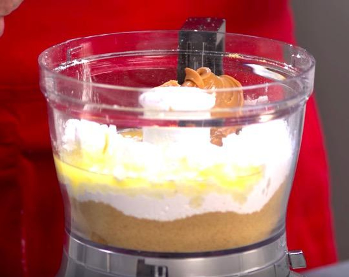 step 1 Put Graham Crackers (1 1/2 cups), Powdered Confectioners Sugar (3 1/2 cups), Butter (9 oz) and Peanut Butter (1 1/2 cups) into a food processor and mix it together.