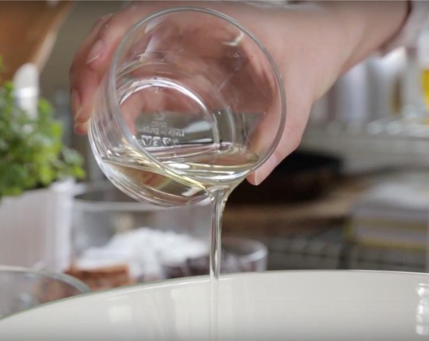 step 2 In a large bowl, add in Vegetable Oil (4 Tbsp).