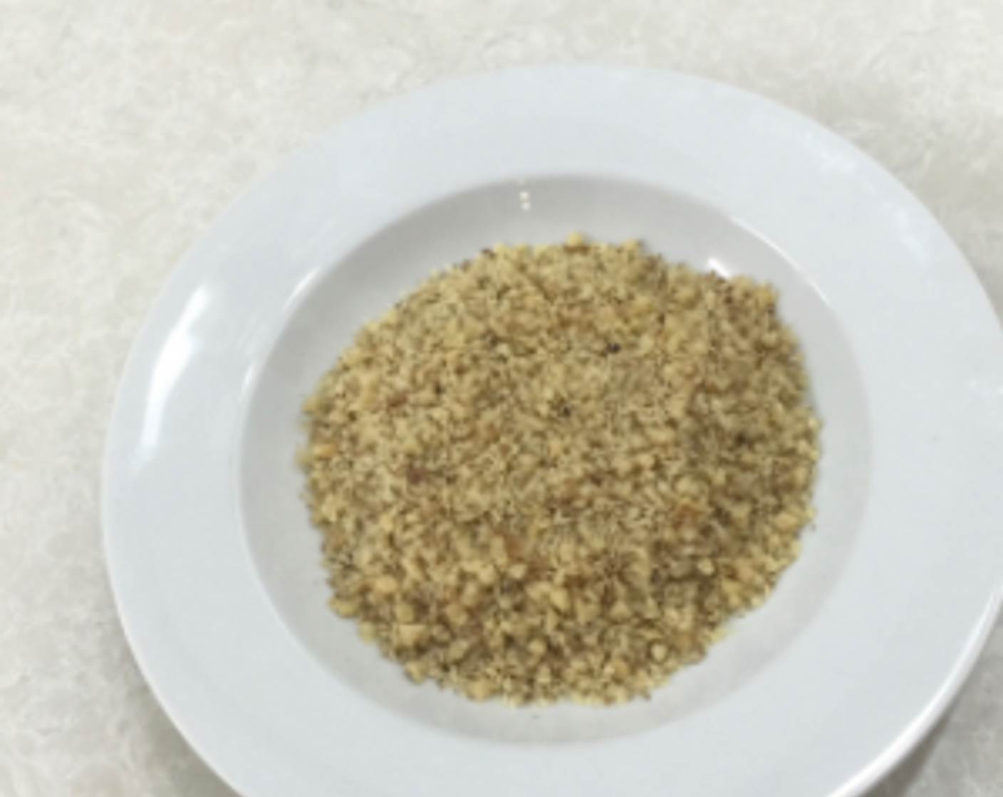 step 5 Put the chopped walnuts in a shallow bowl and set aside.