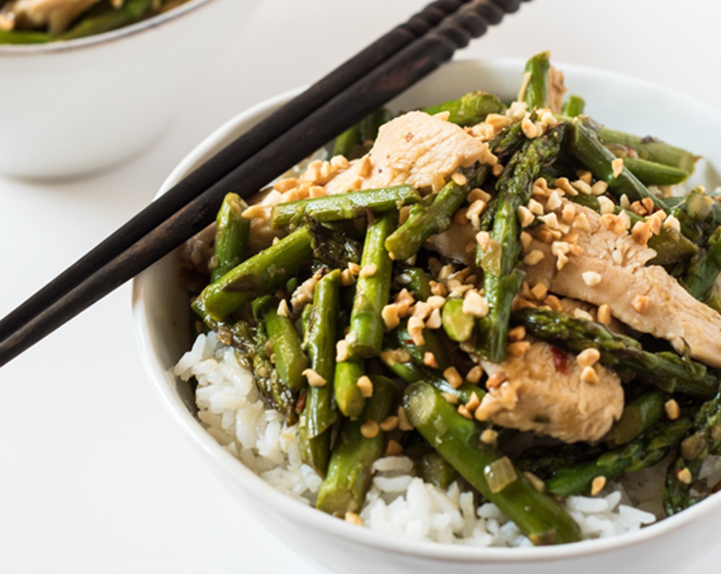 step 7 Spoon the lemongrass chicken and asparagus over the rice and sprinkle some Cashew Nuts (4 Tbsp) if desired.