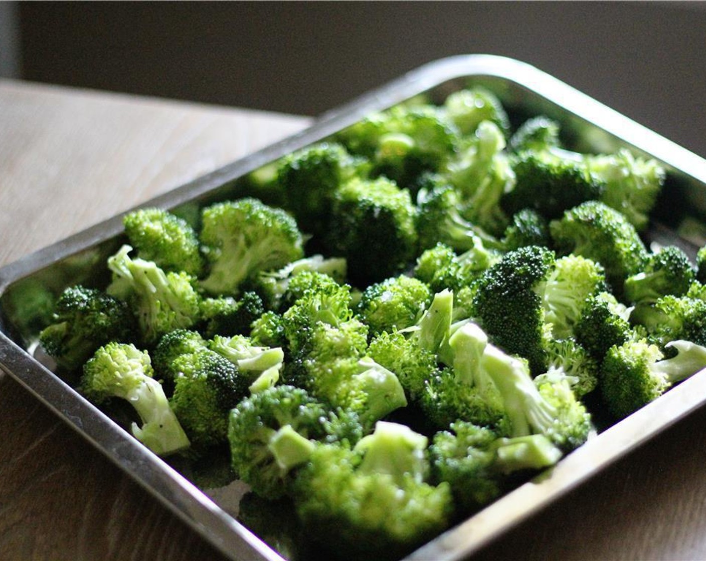step 2 Cut Broccoli (5 cups) into spears or bite sizes pieces and place into bowl with Olive Oil (2 Tbsp), Garlic (2 cloves), Salt (to taste) and Black Pepper ( to taste) toss ingredients together to coat broccoli, Balsamic Vinegar (1/2 cup) and Fresh Thyme (2 tsp) set aside.