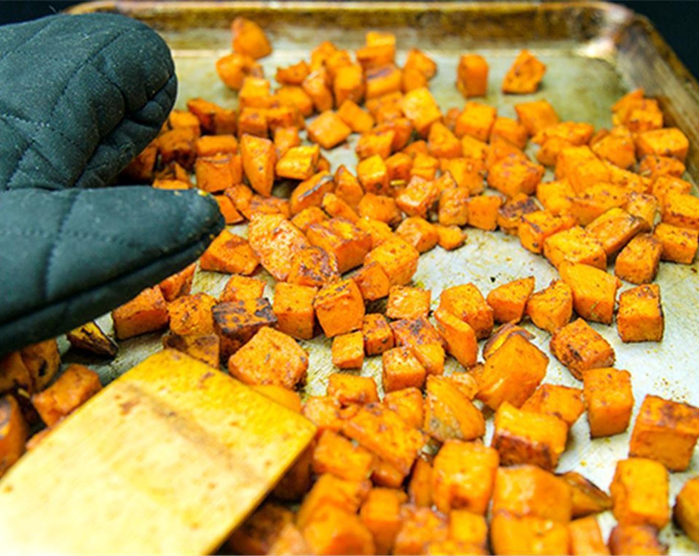 step 6 Bake in oven for 15 minutes, then turn the potatoes over and continue baking until the sweet potatoes are golden and tender, about another 15 min or so. Wait for potatoes to cool, and enjoy!