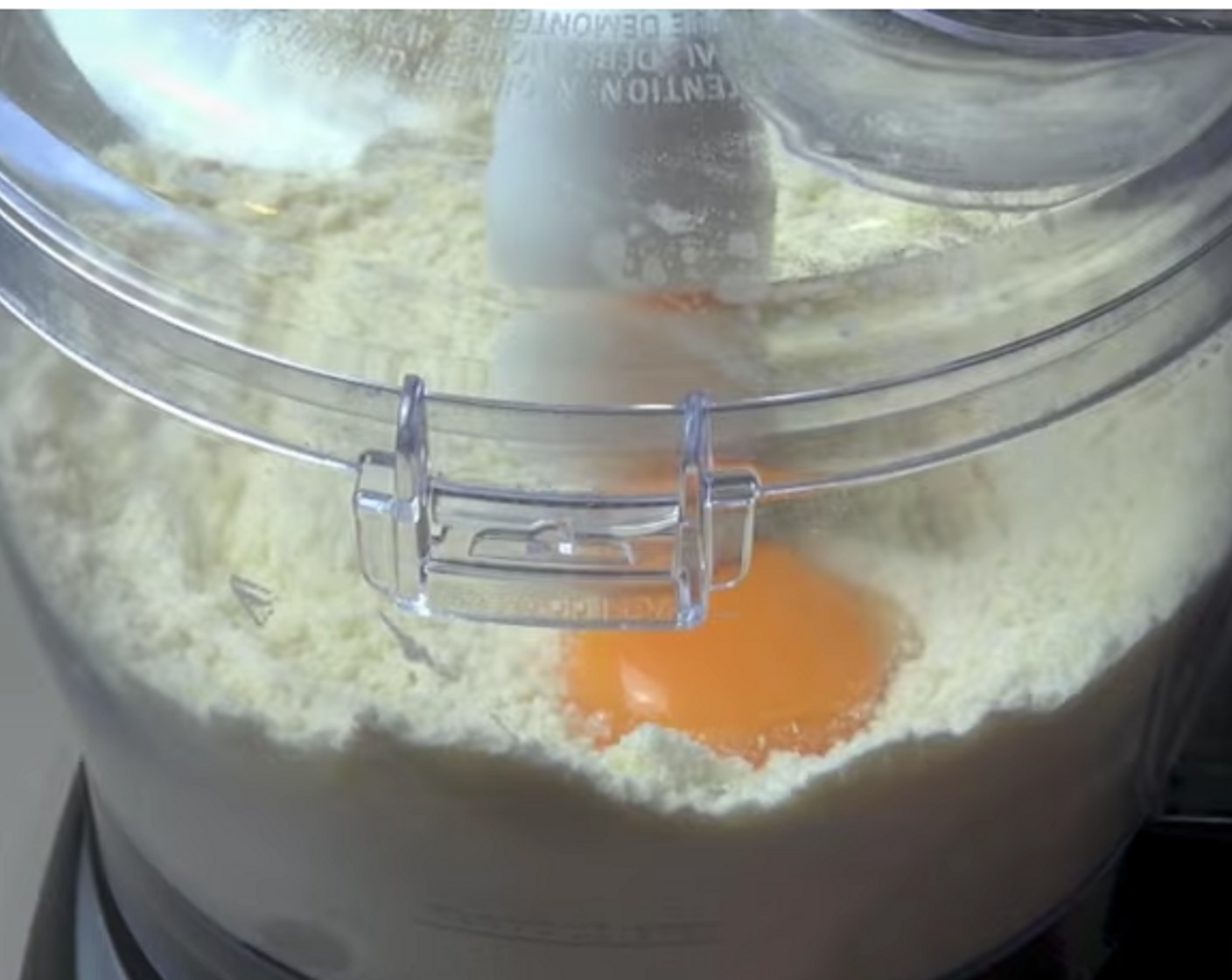 step 1 Into a food processor, pulse together the All-Purpose Flour (1/2 cup), Caster Sugar (2 Tbsp), and Butter (4 oz). Then add in your Egg (1) and Water (1 Tbsp).  Combine everything well.
