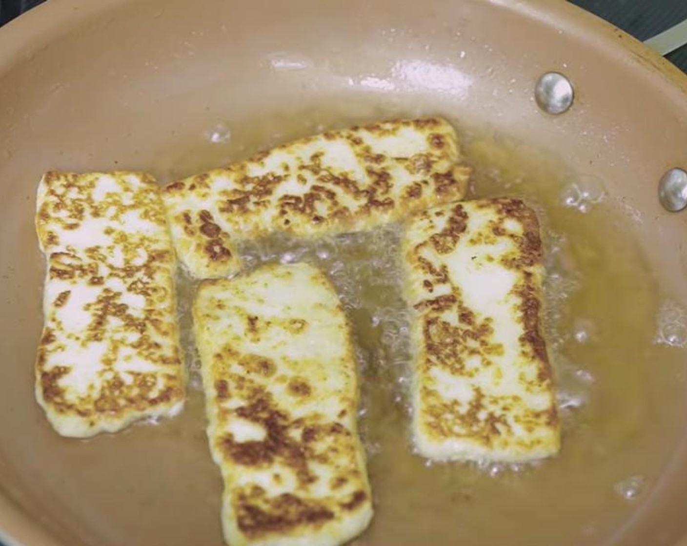 step 5 Then fry the Cheese (to taste) until it's golden brown on both sides. Fry the Dominican Salami (to taste) until it develops color on both sides.