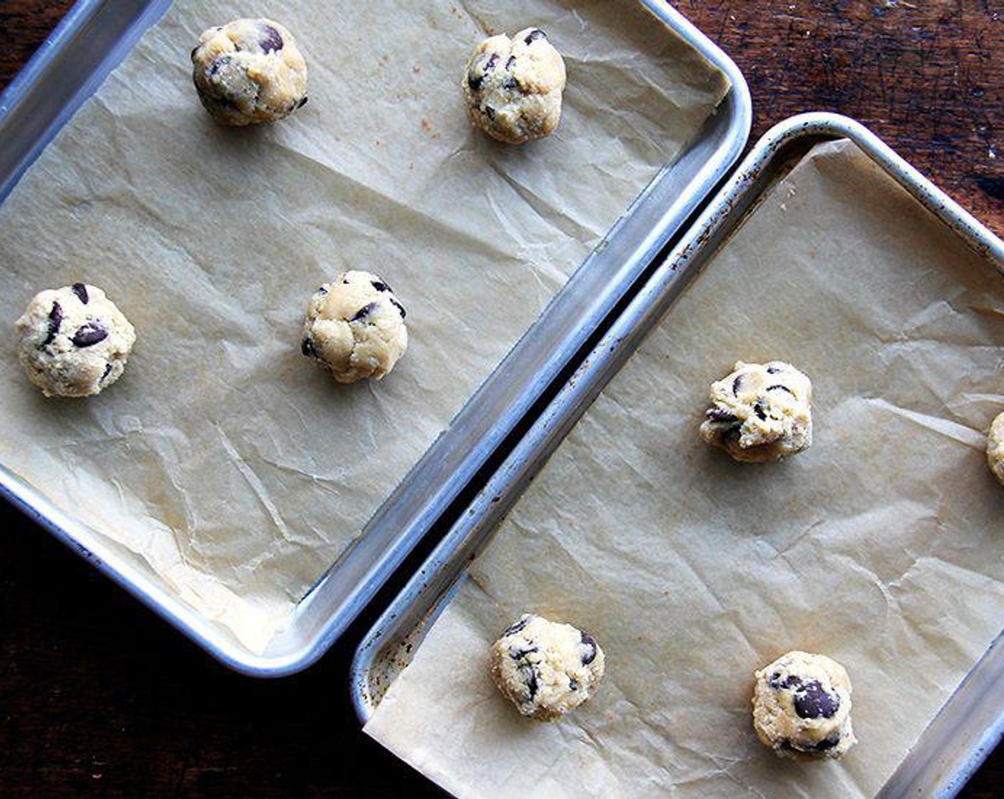step 5 Place portioned balls nicely spaced on an ungreased or parchment-lined jelly roll pan. Sprinkle with Sea Salt (to taste), if using. Bake for 11 minutes, rotating the sheet halfway through cooking. Keep a close watch.